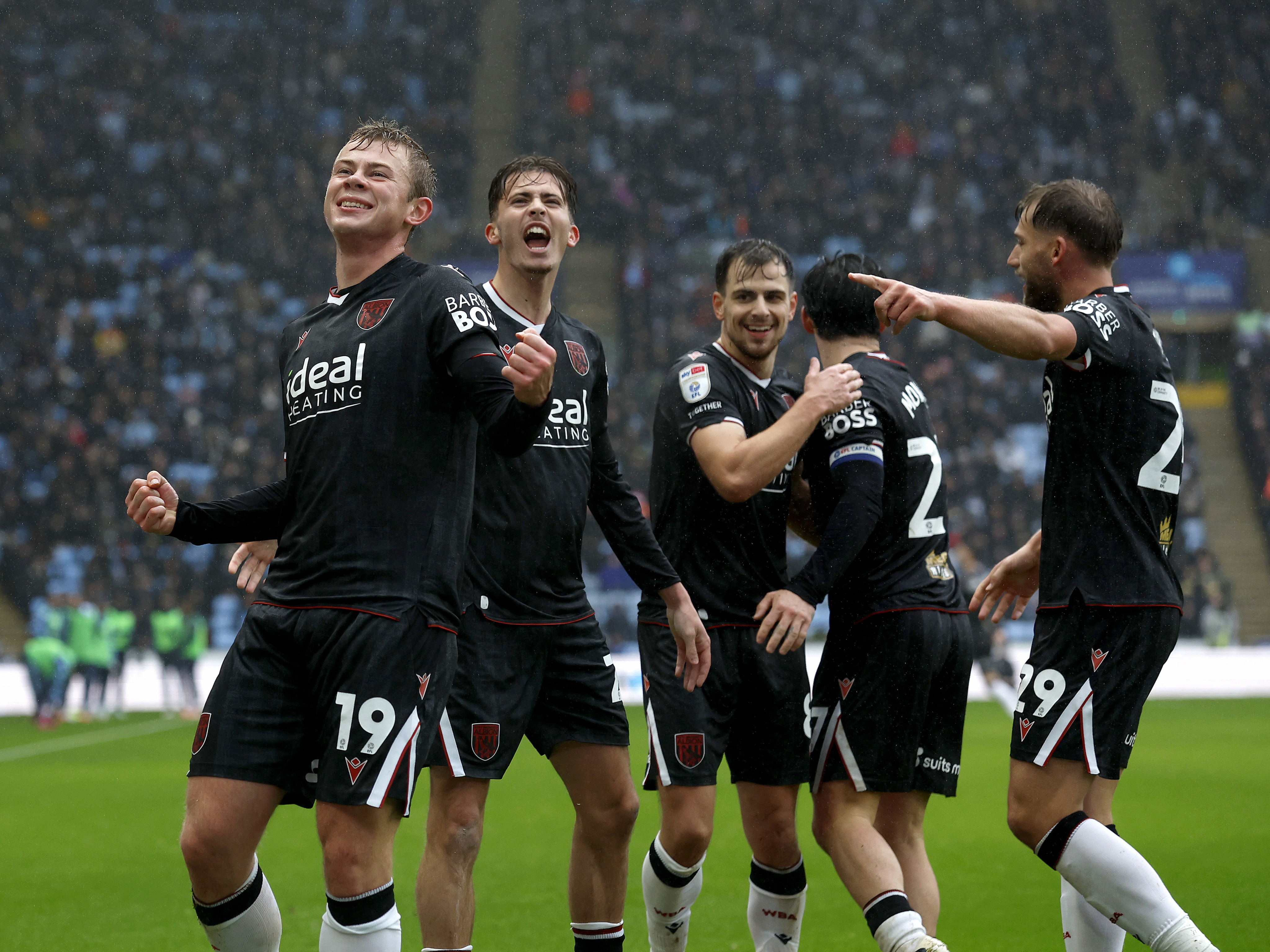 Aune Heggebø celebrates scoring for WBA in the black away kit at Coventry 