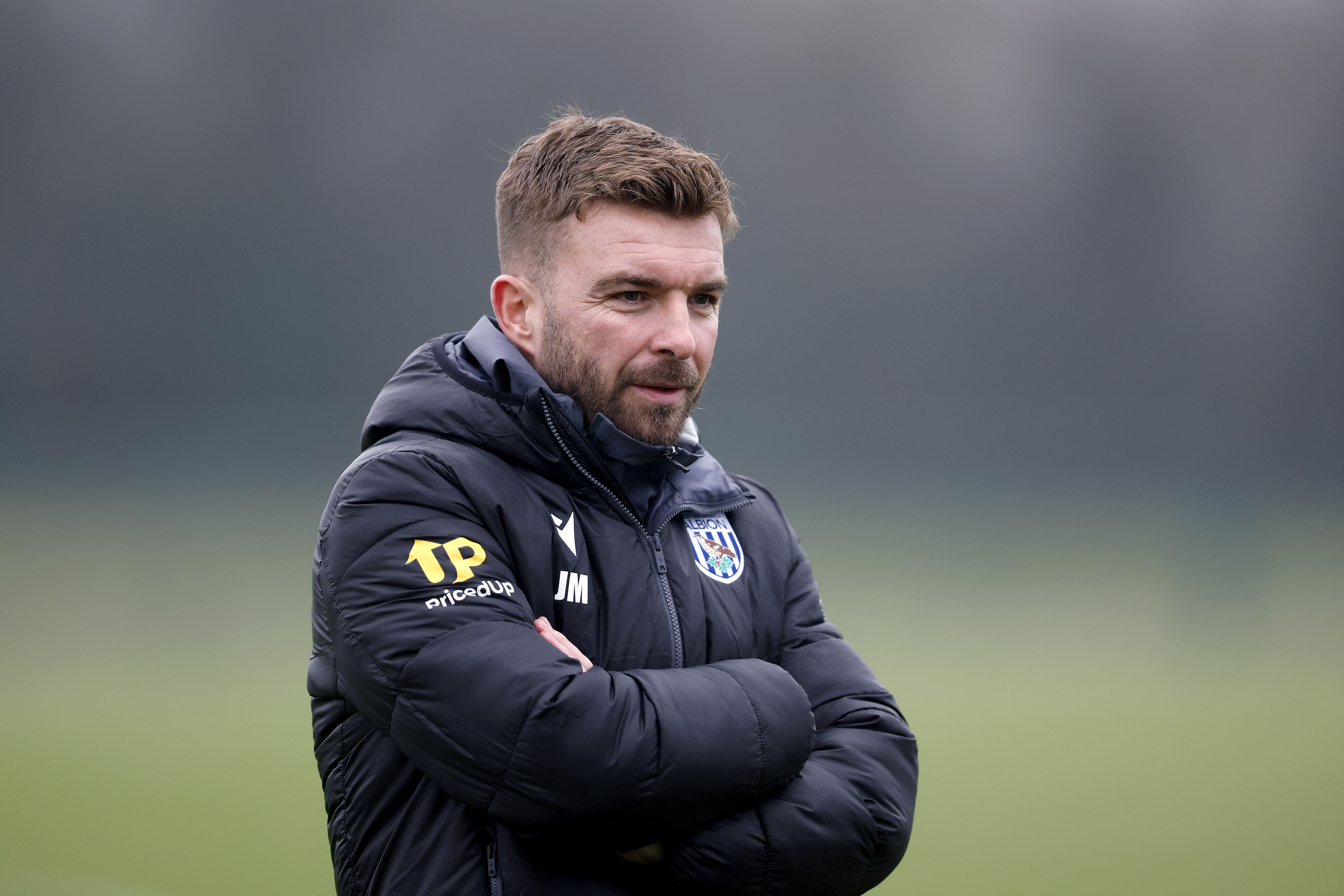 James Morrison with his arms crossed while out on the training pitch 