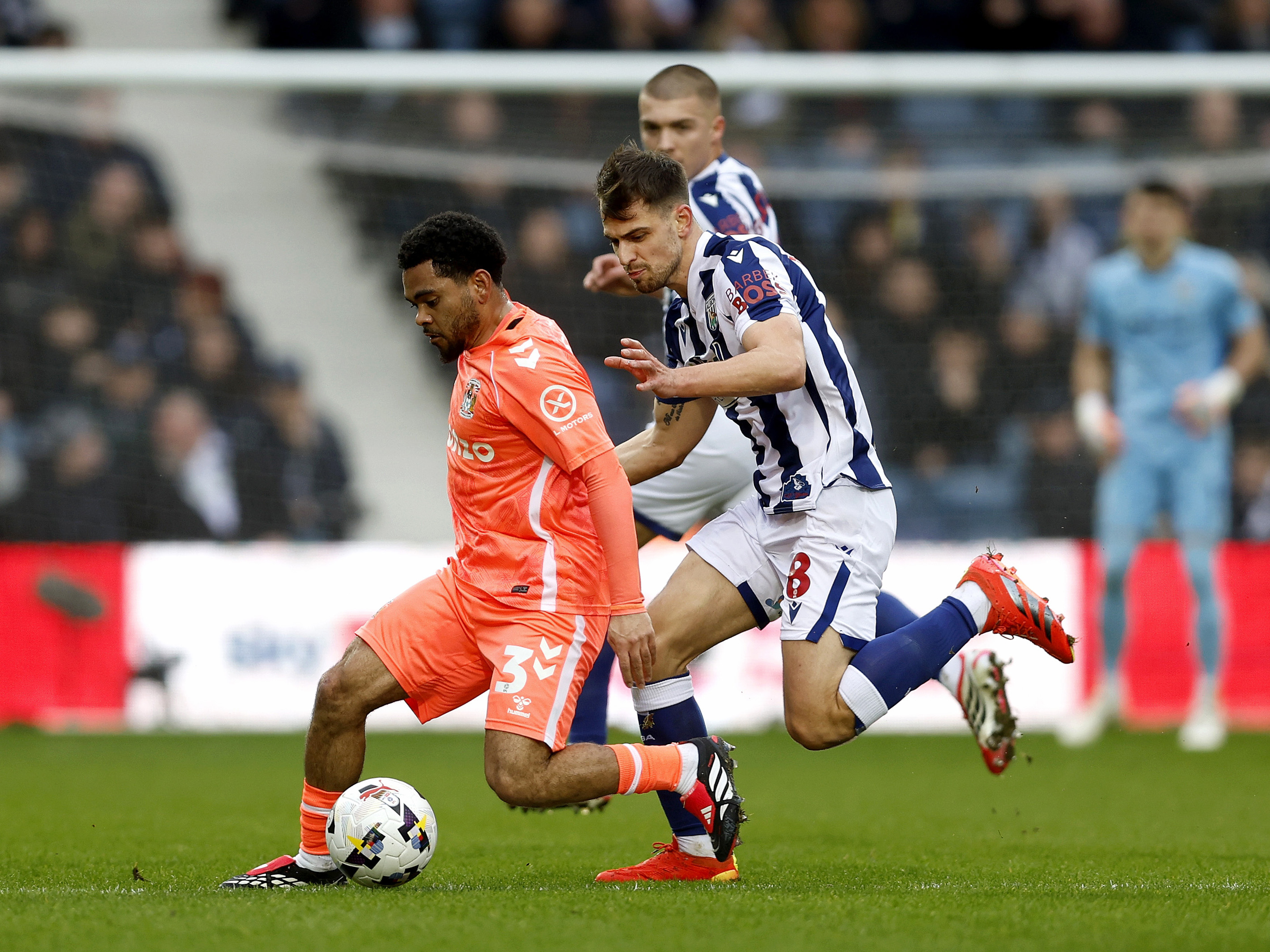 An image of Jayson Molumby playing against Coventry