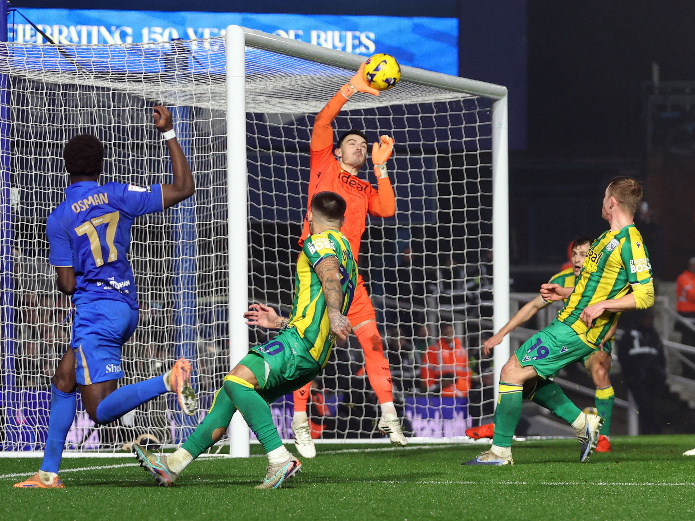 A photo of goalkeeper Max O'Leary making a save against Birmingham City