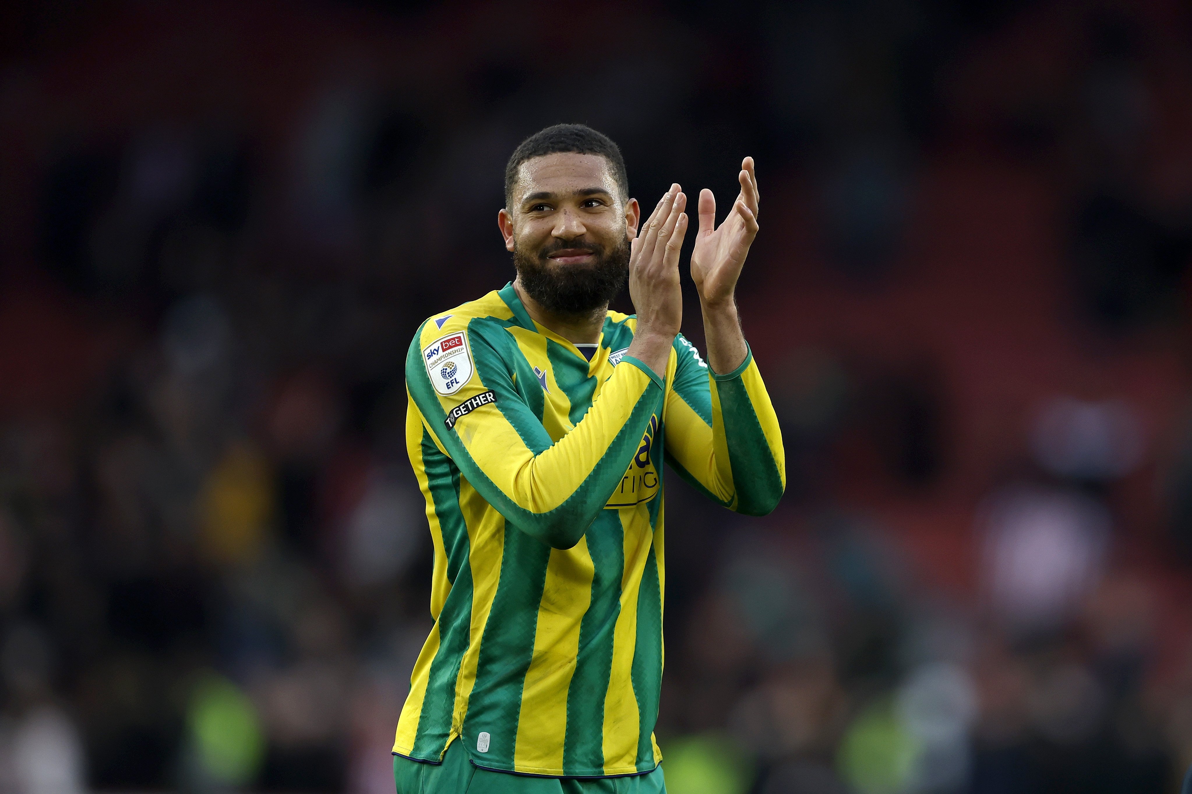 George Campbell applauds the fans