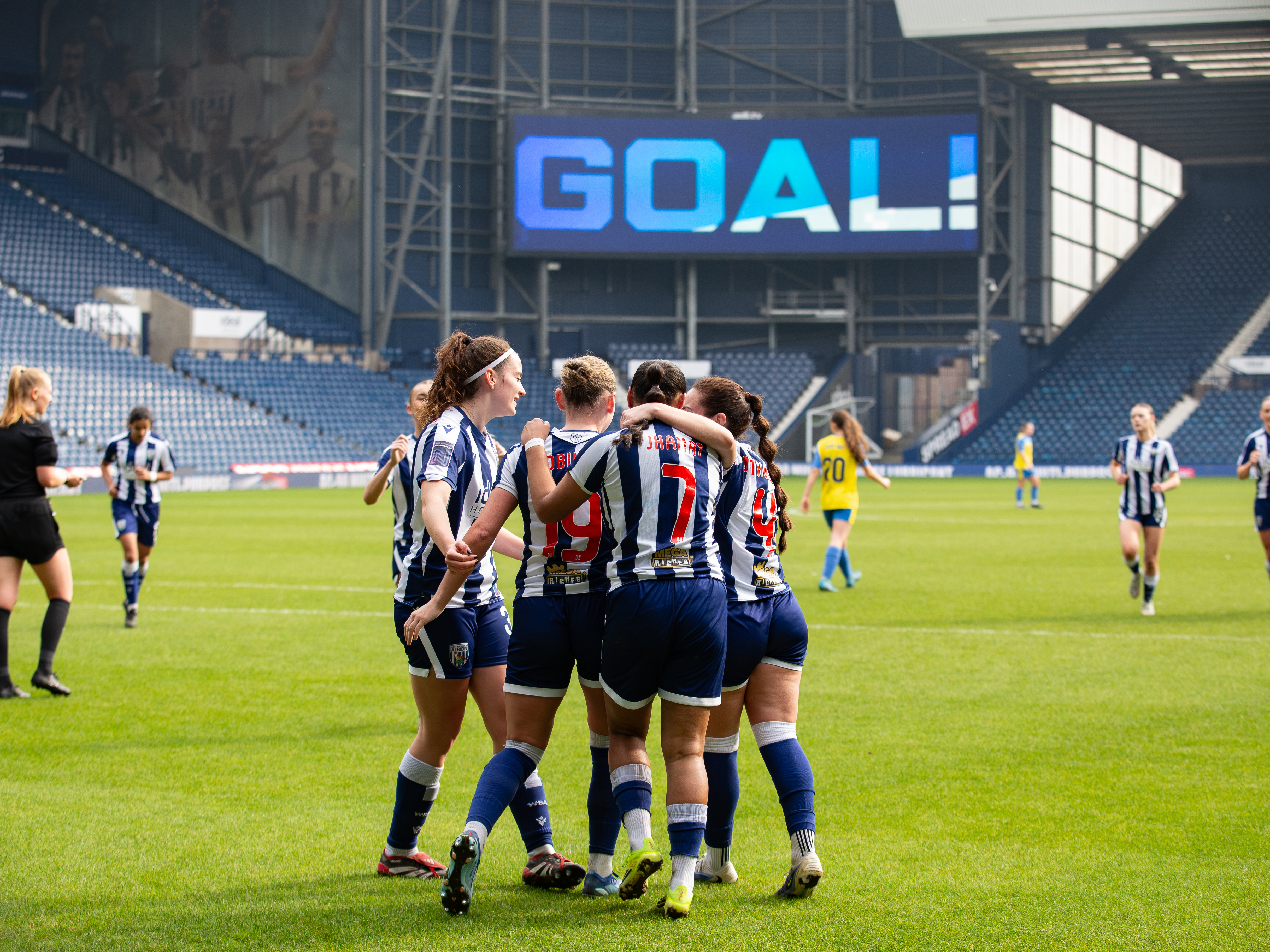 Albion Women celebrating.