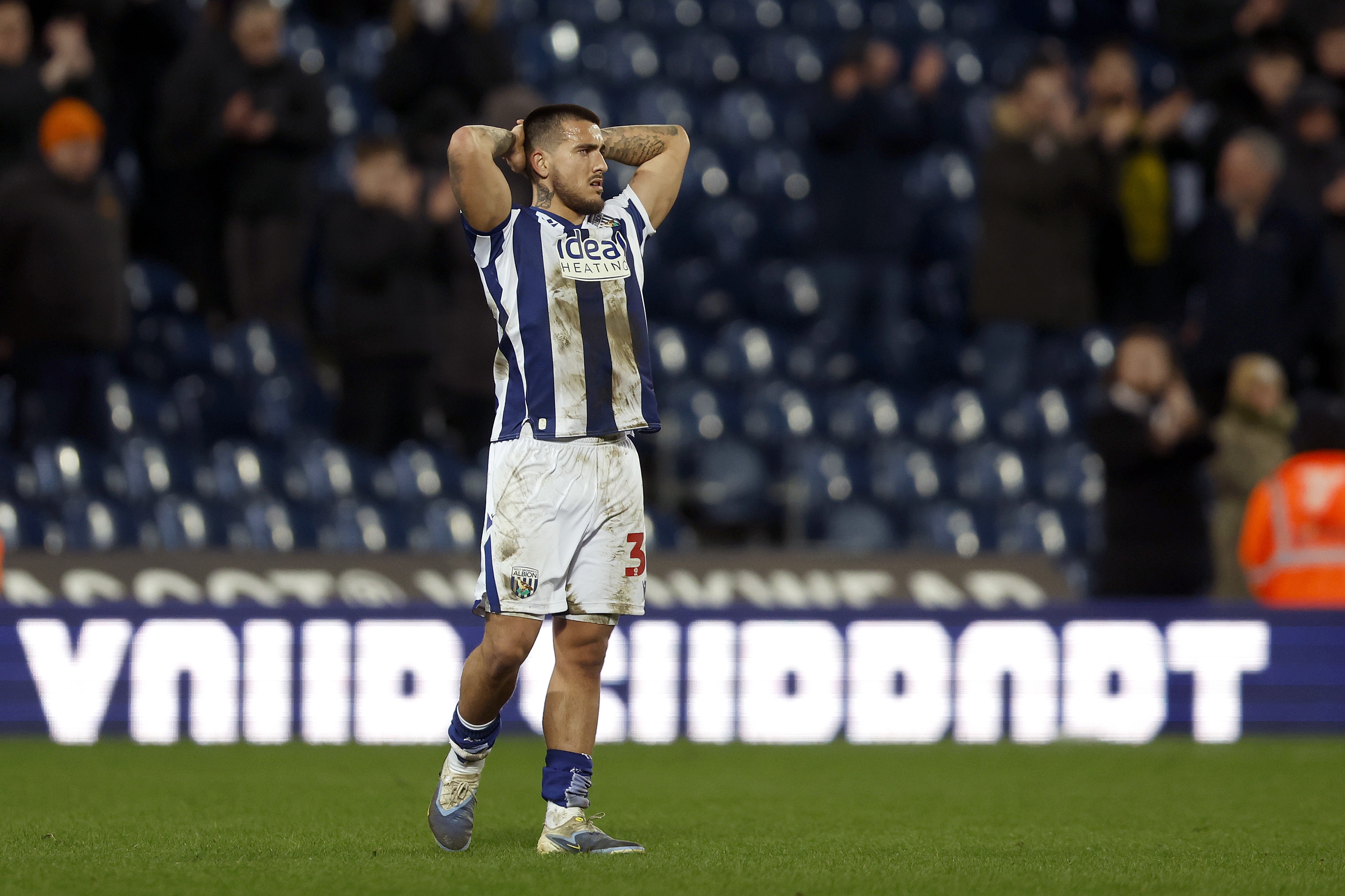 Danny Imray with his hands on his head 