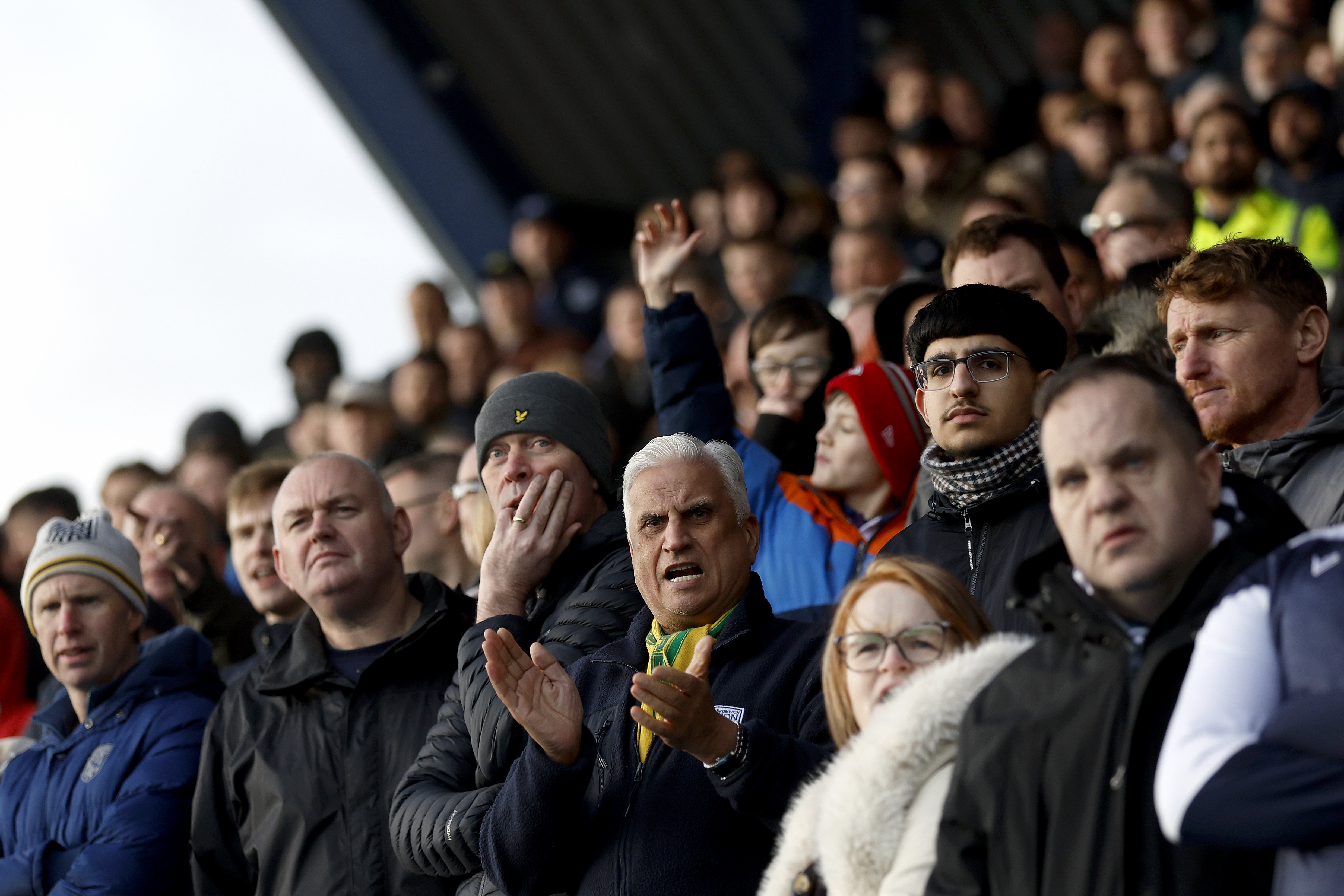 WBA fans in the stand at an away game 