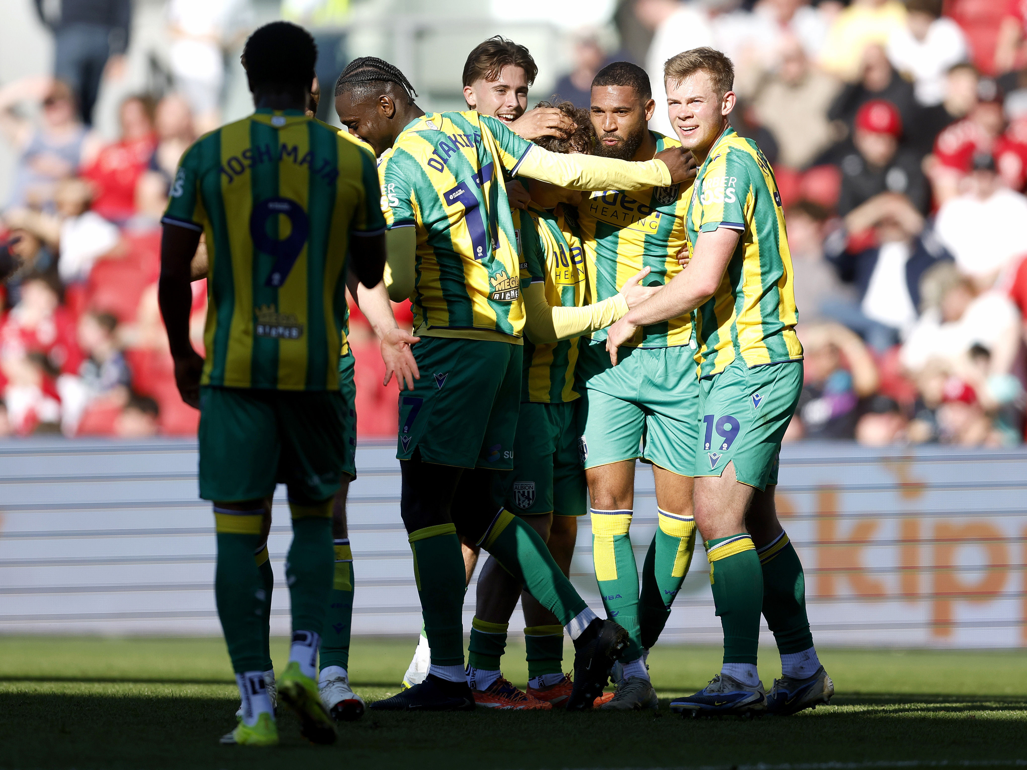 An image of Albion celebrating George Campbell's goal against Bristol City