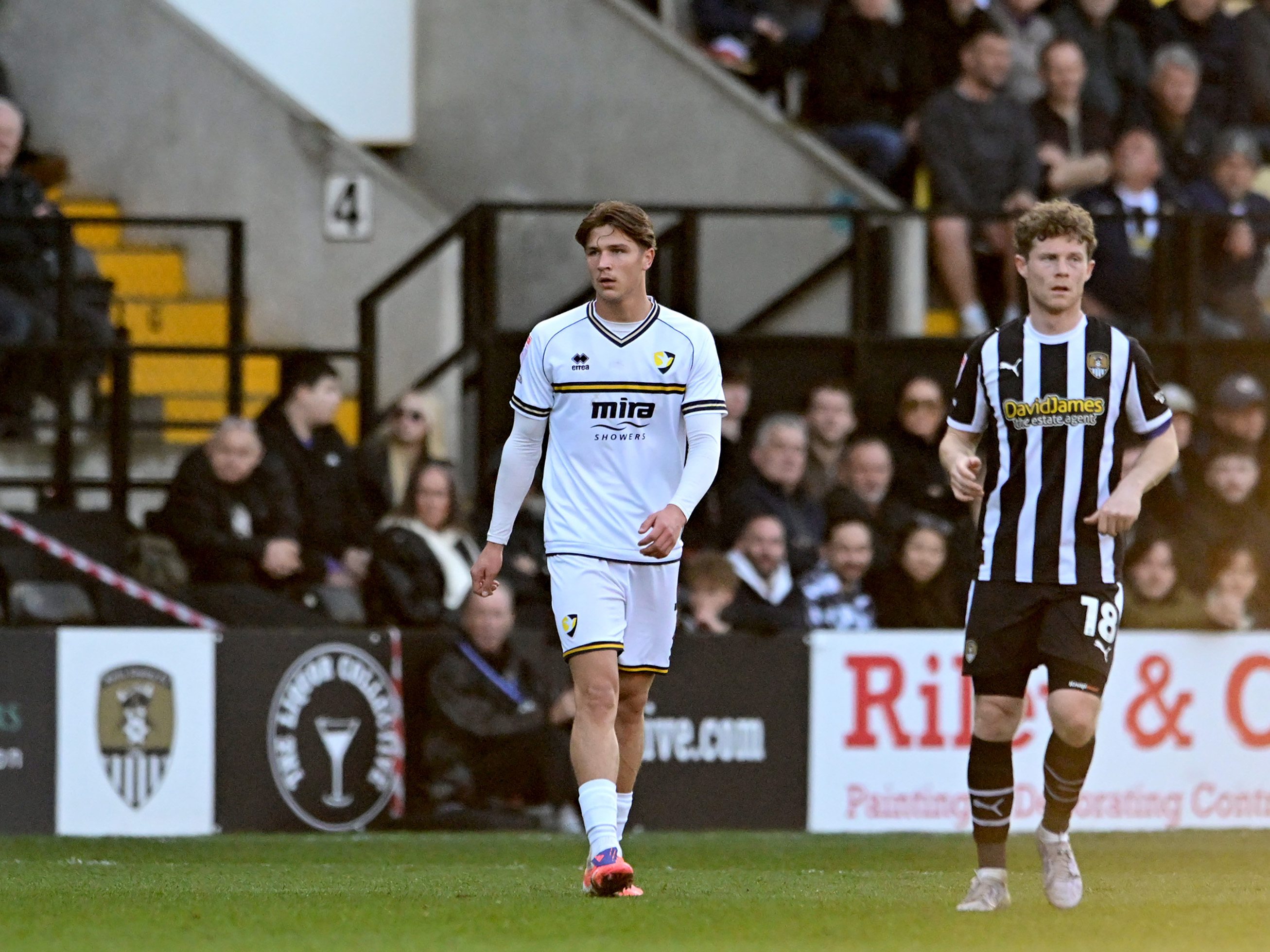 A photo of youngster Cole Deeming in action for loan team, Cheltenham Town