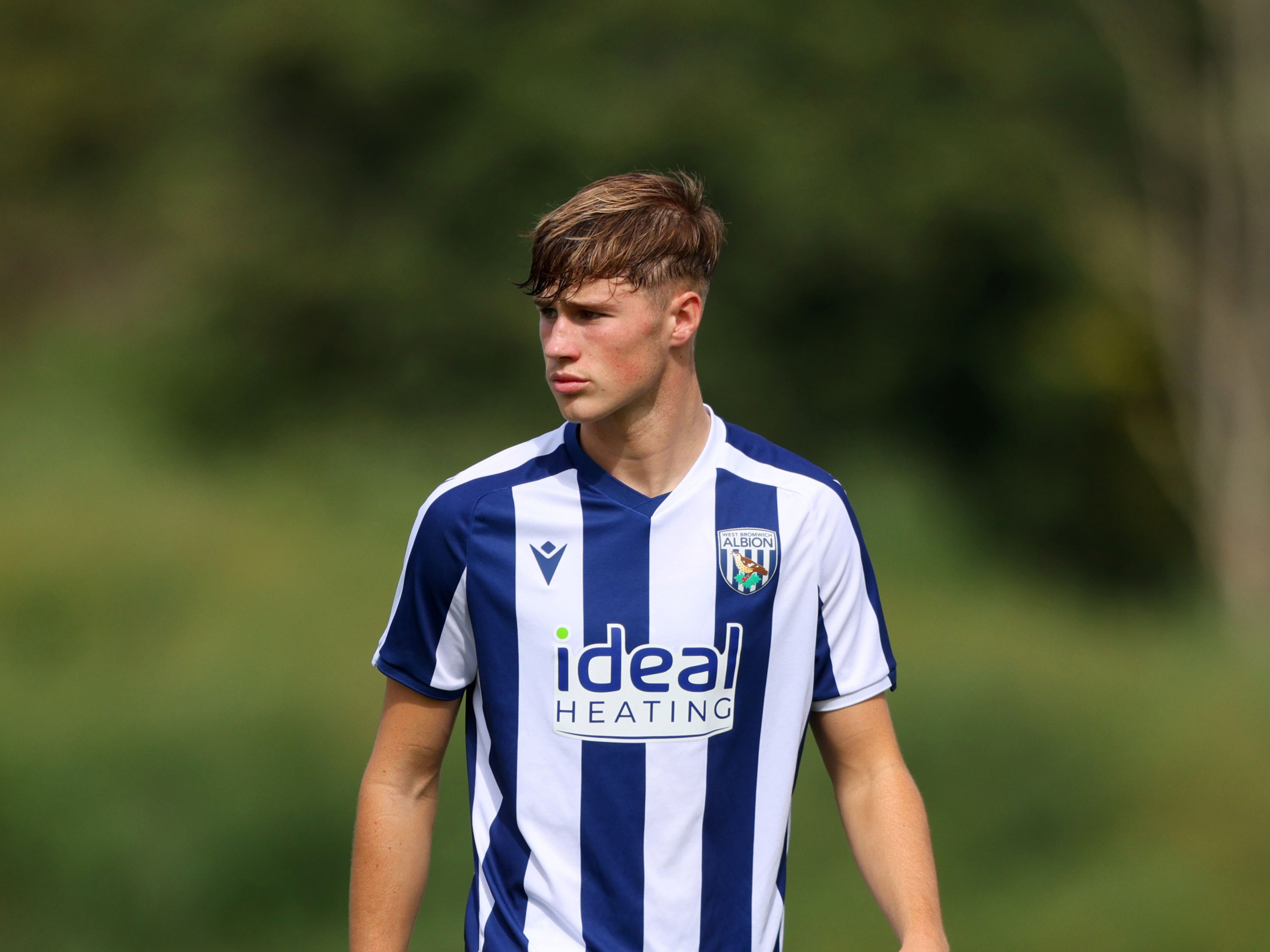 George Shaw in action for Albion's U18s in the home kit 
