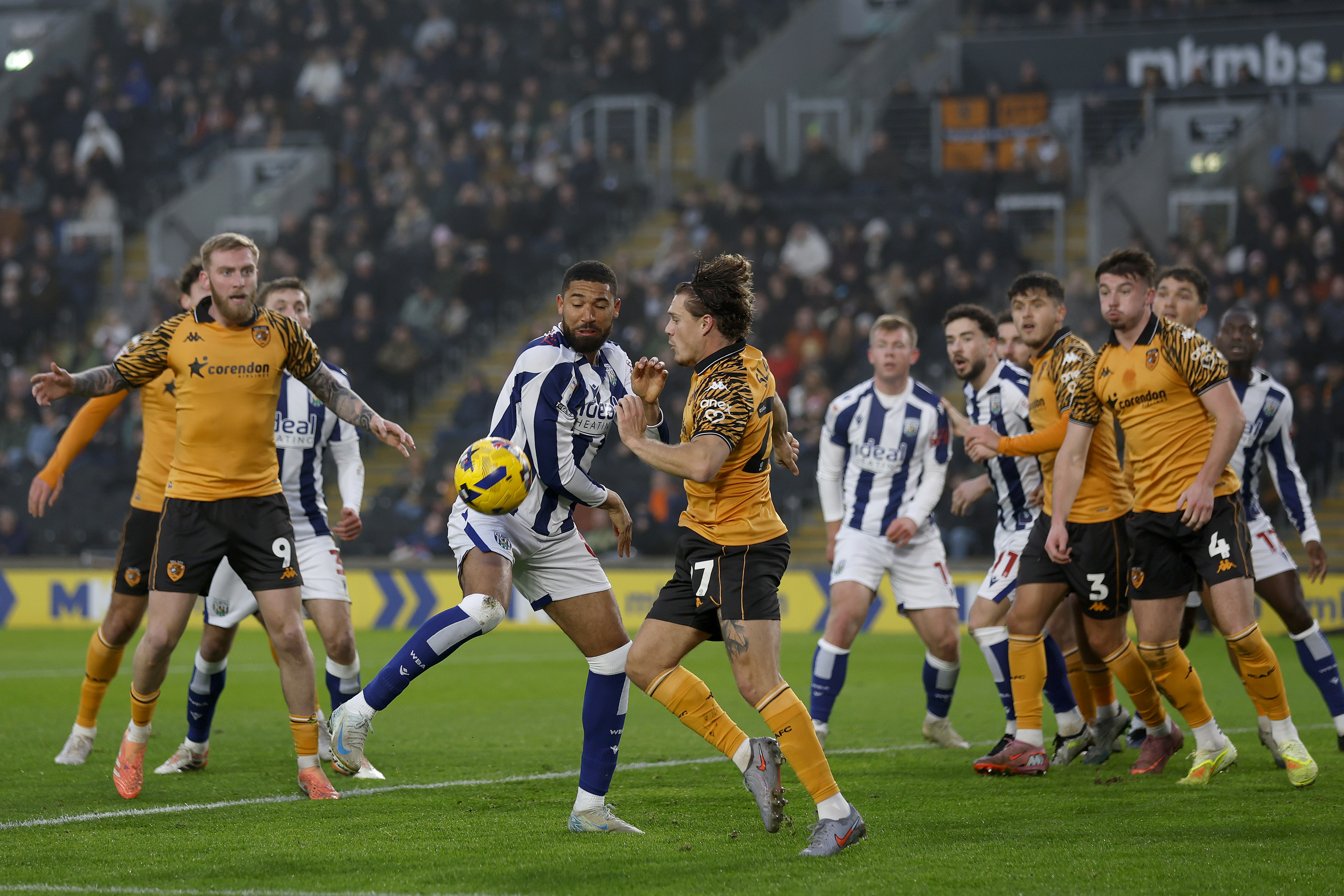 general match action with the ball in the penalty area in the match between Hull and WBA
