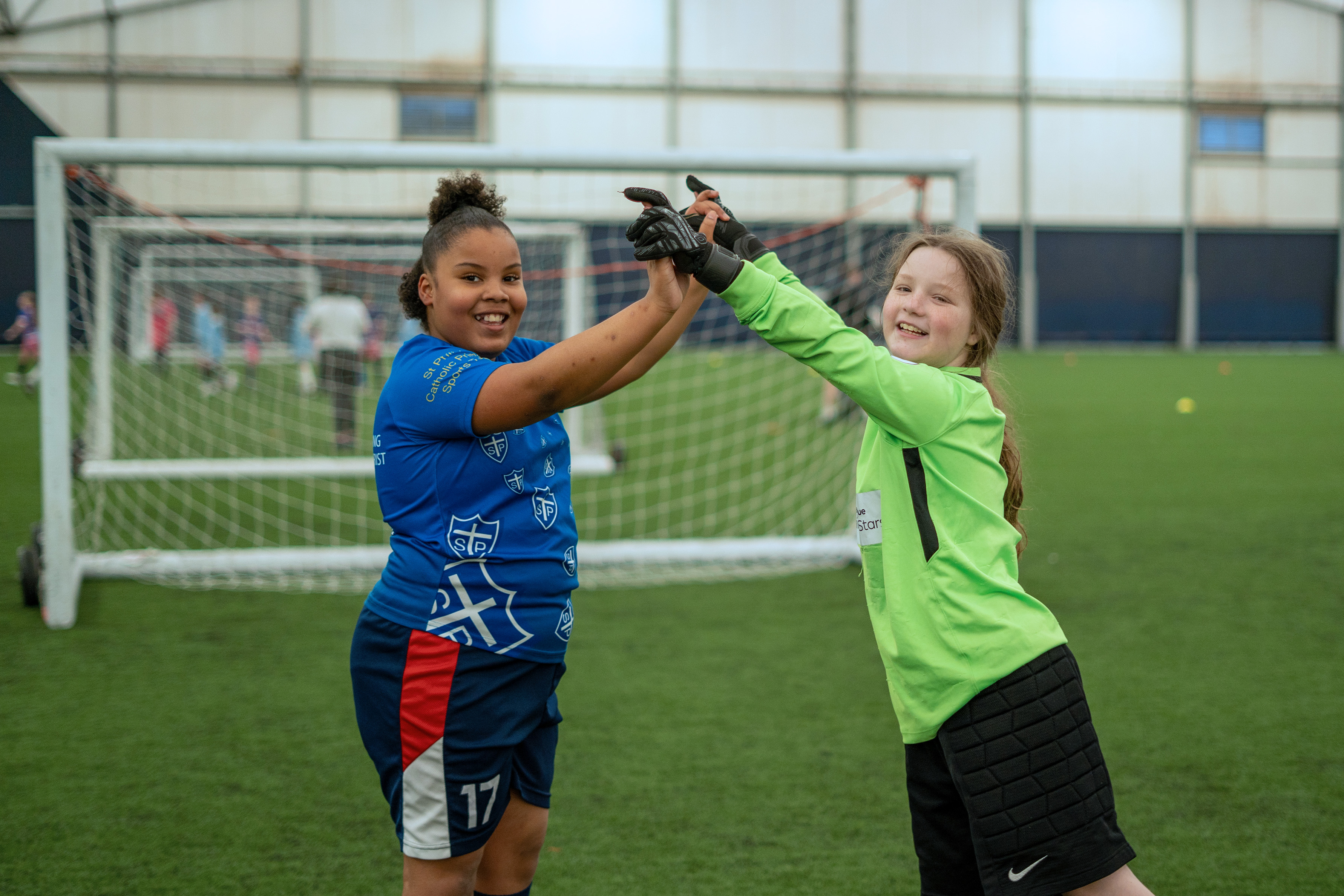Two players exchanging high fives