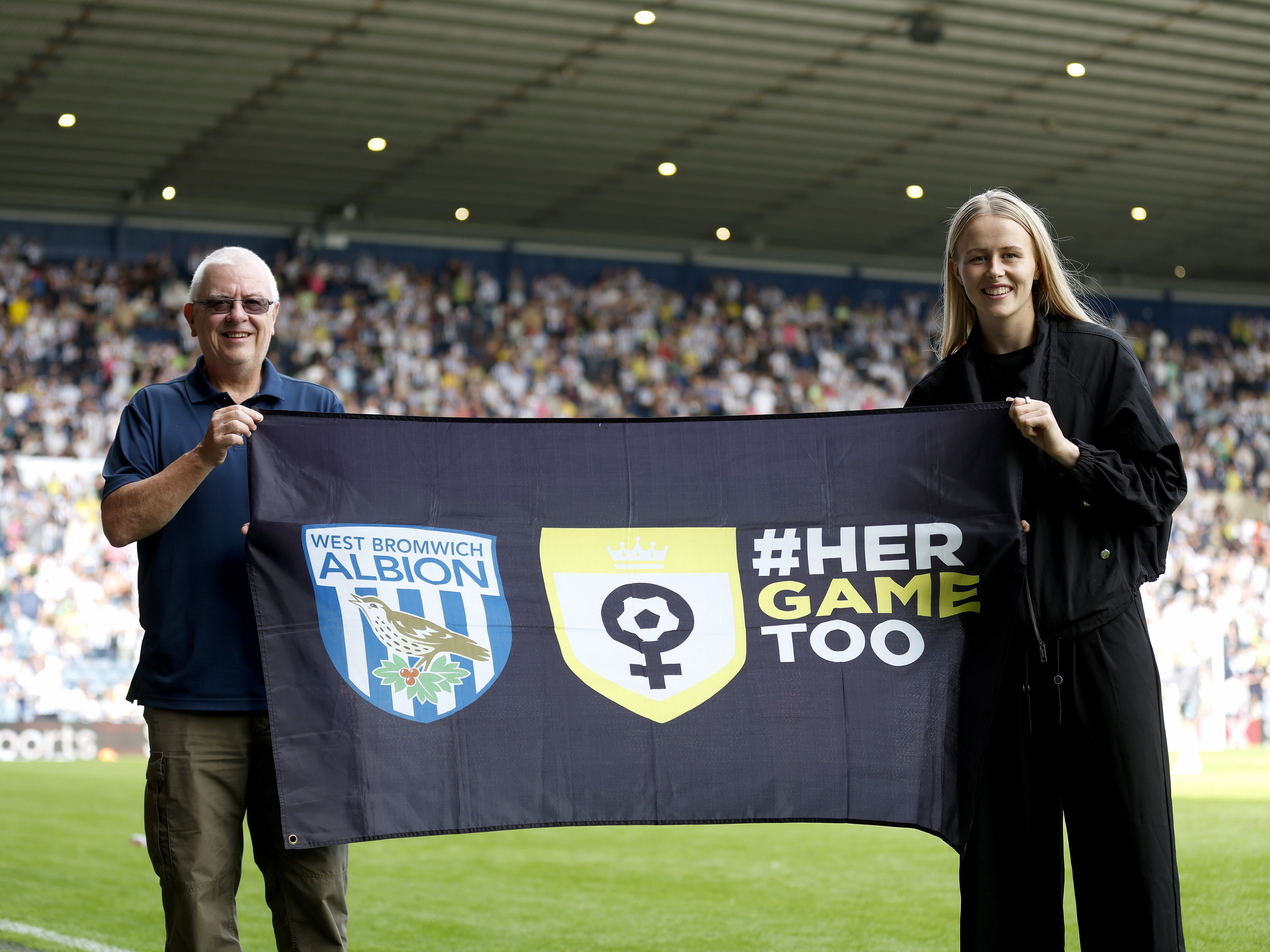 An image of Hannah Hampton with a Her Game Too flag