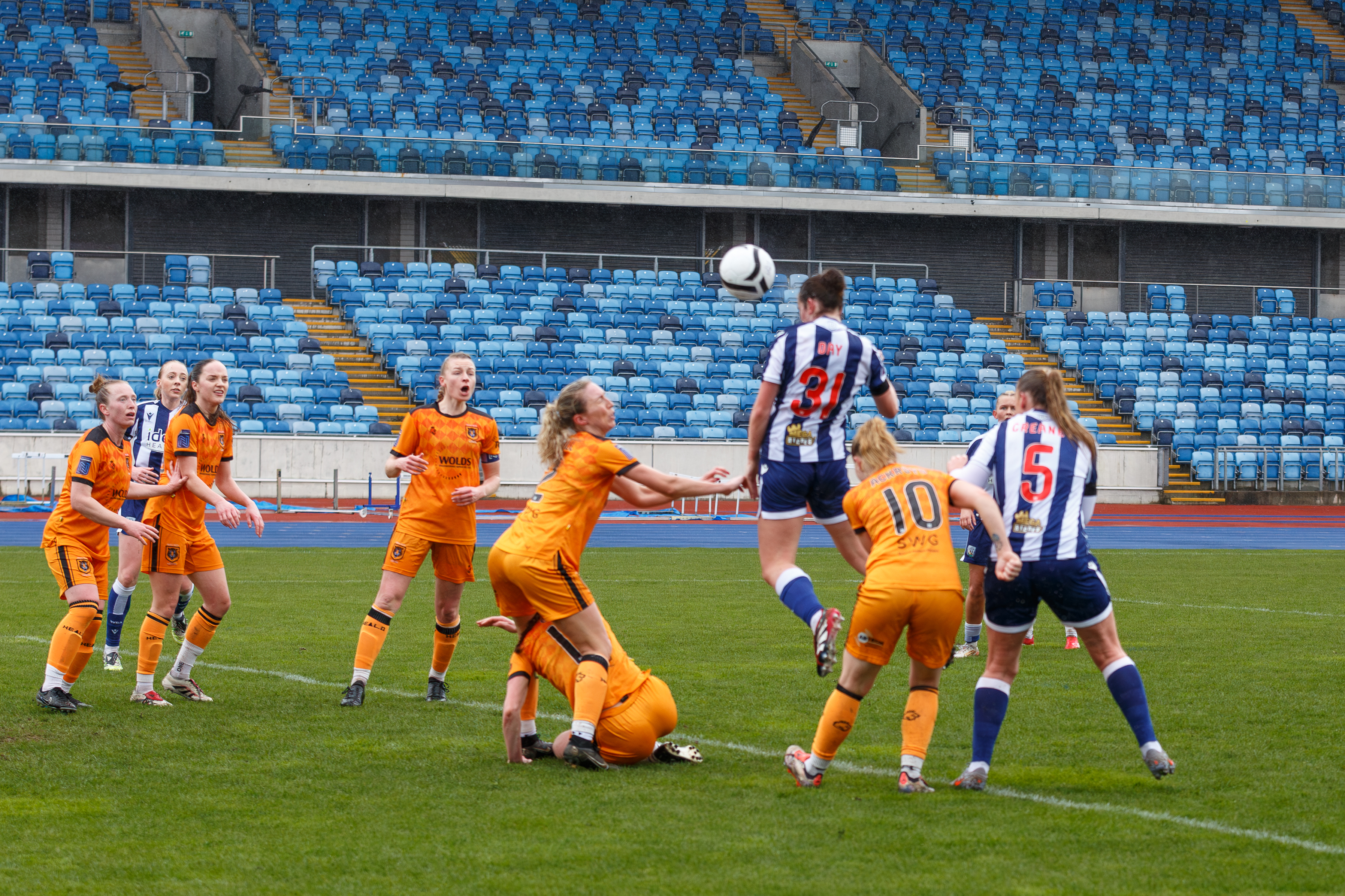 Lucy Day heading home against Hull City.