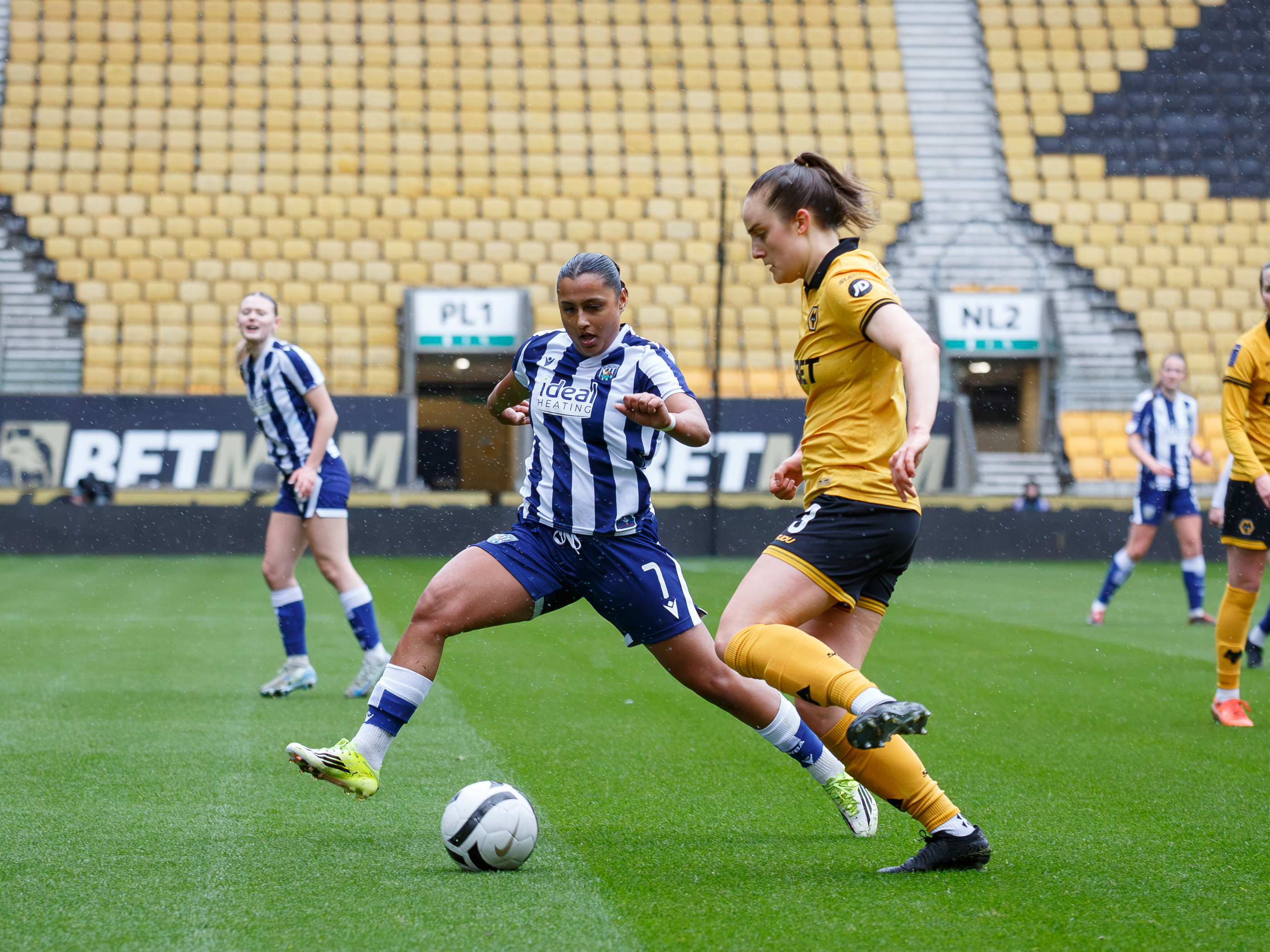 Simran Jhamat battles at Molineux.
