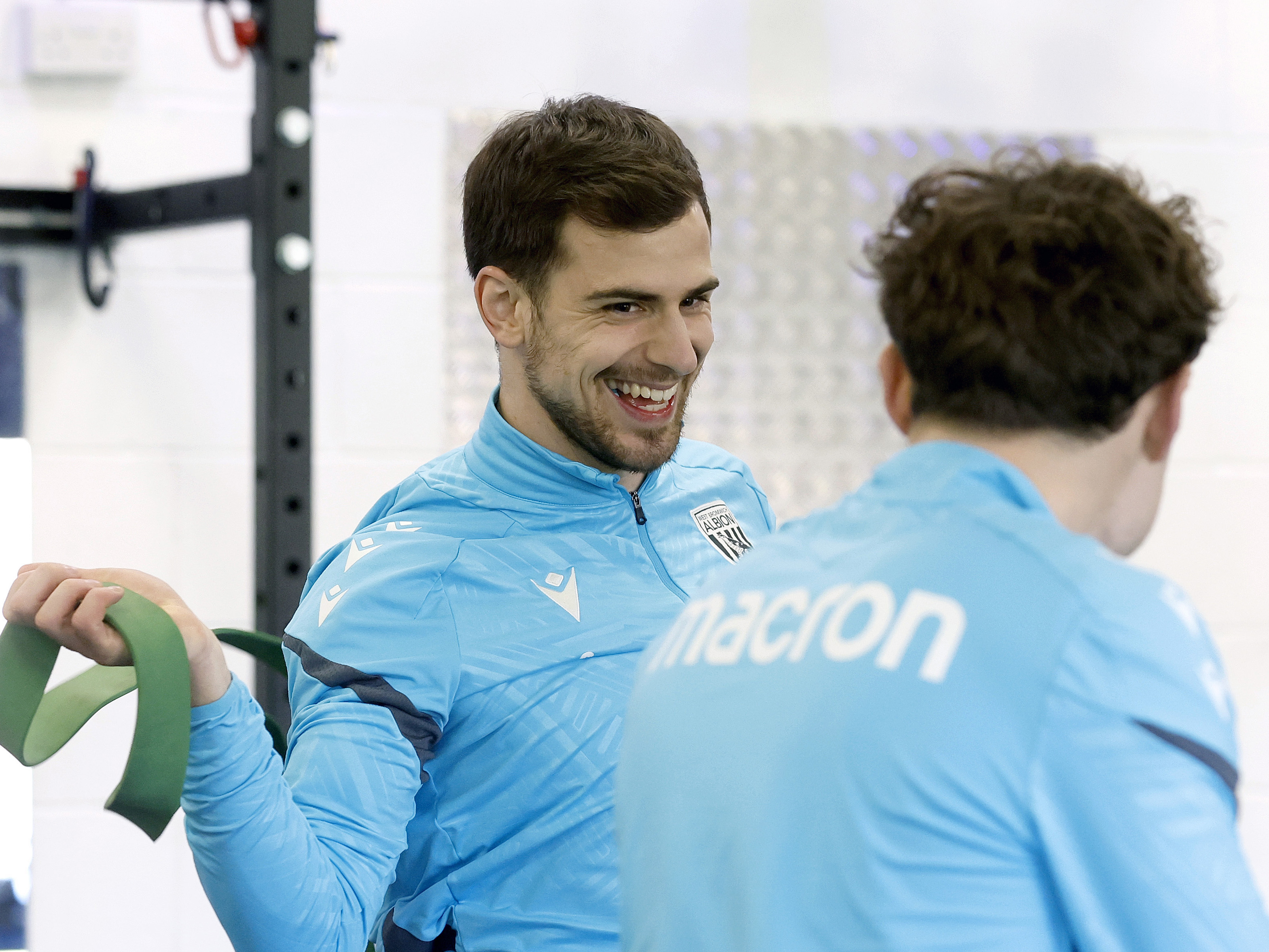 Jayson Molumby smiling and laughing in the gym 