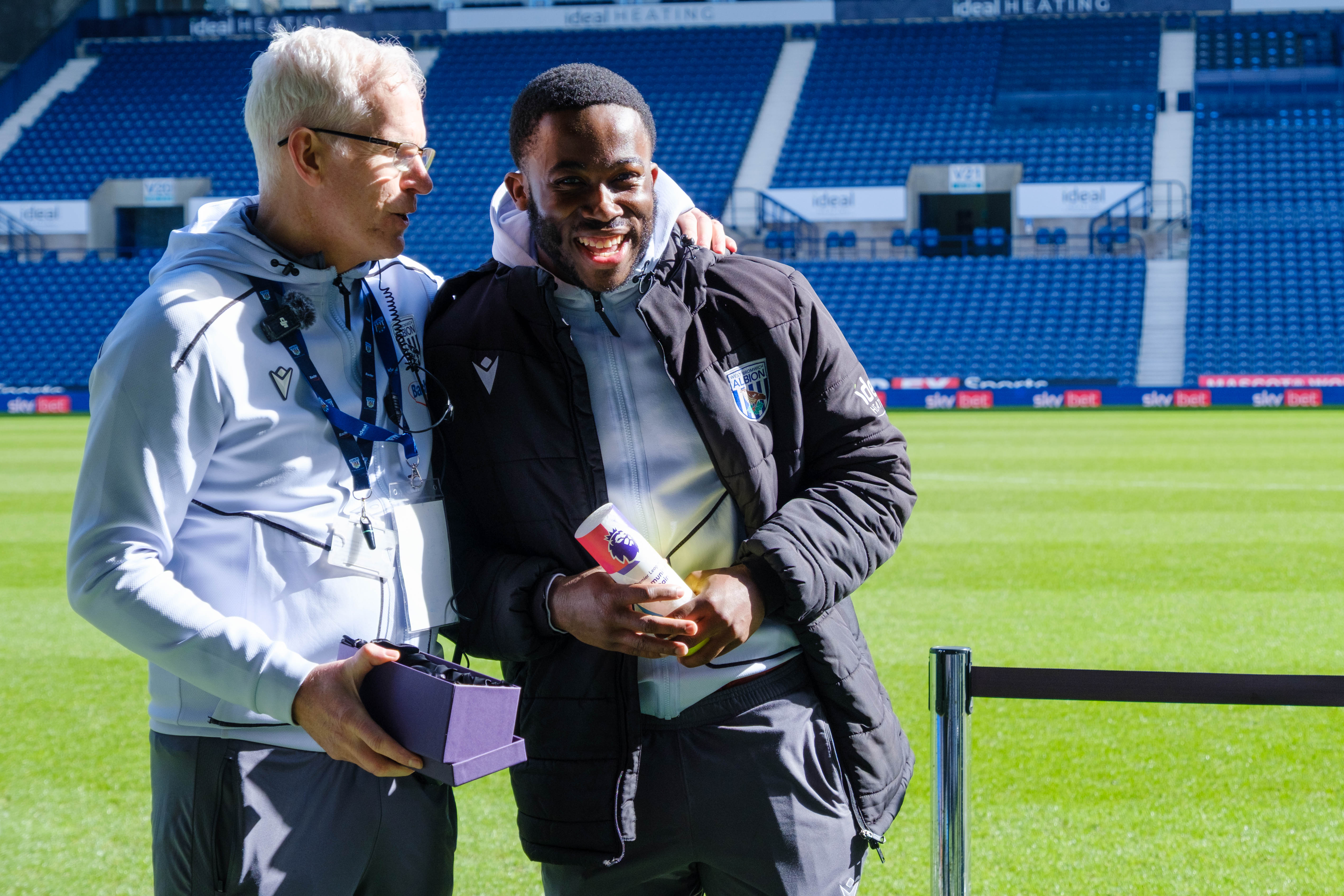 Kadeem Jordan with Foundation Director Rob Lake presenting him with the award.