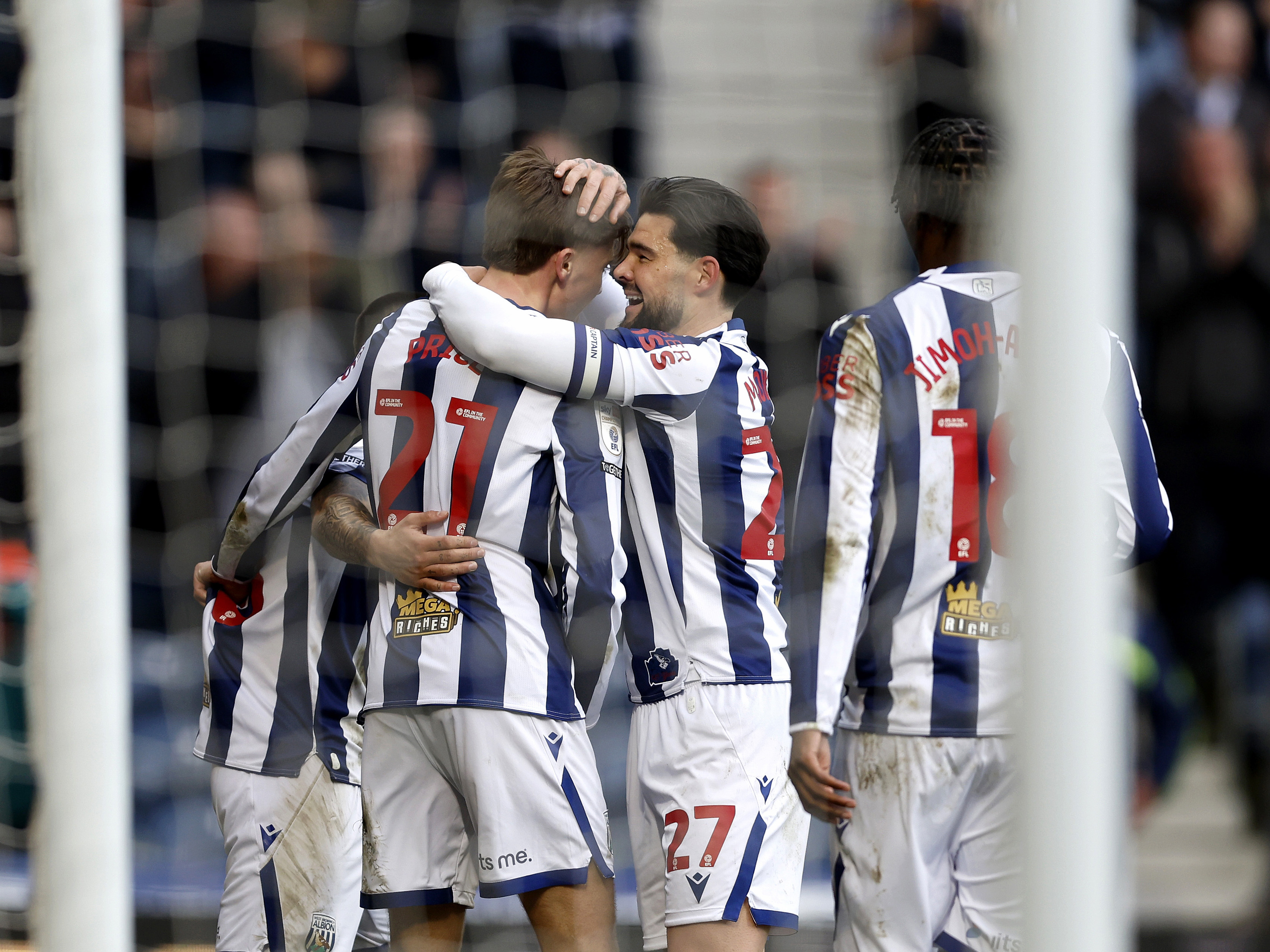 Isaac Price celebrates with team-mates after scoring against Hull City