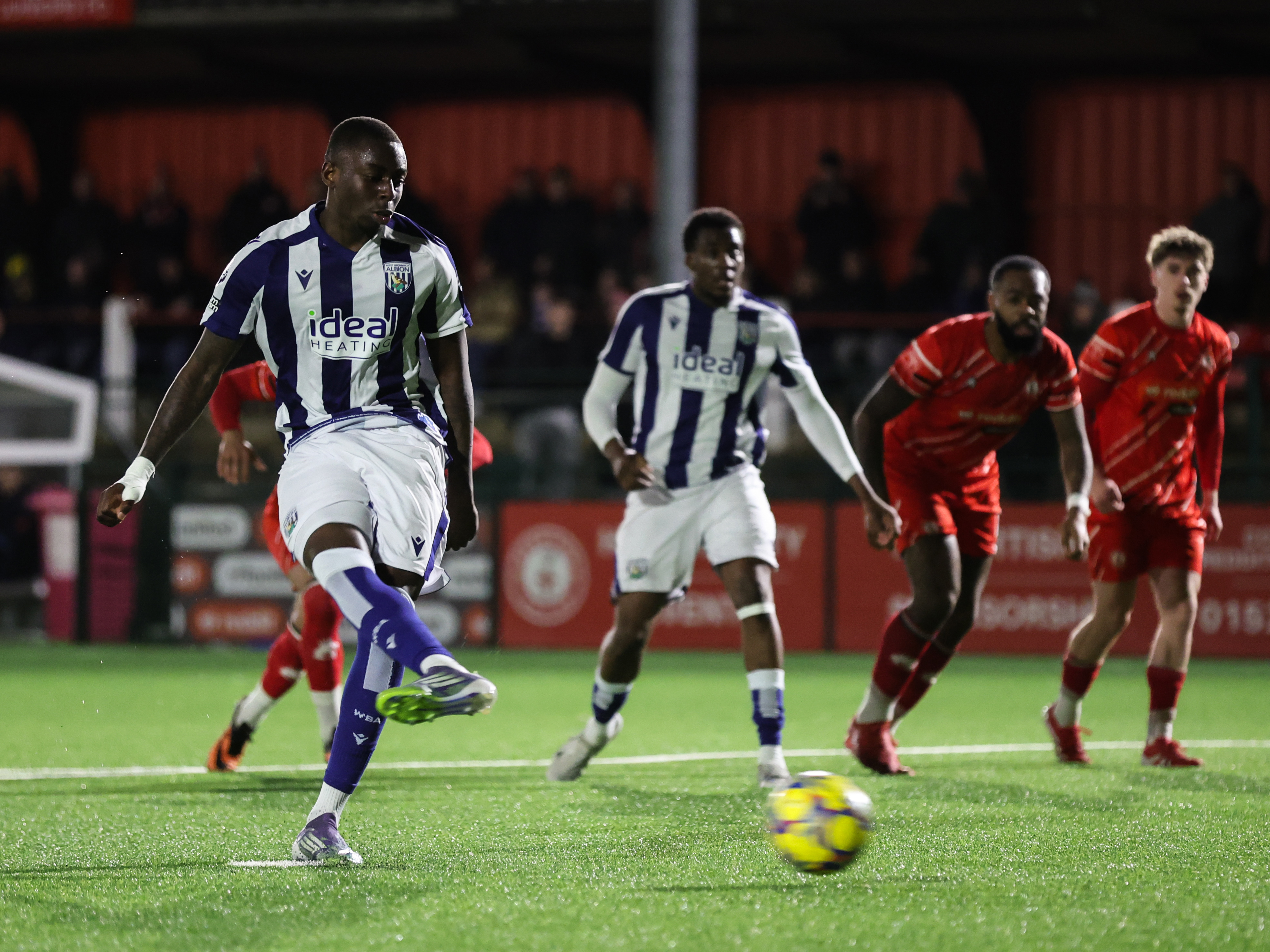 An image of Esoesa Sule scoring against Redditch