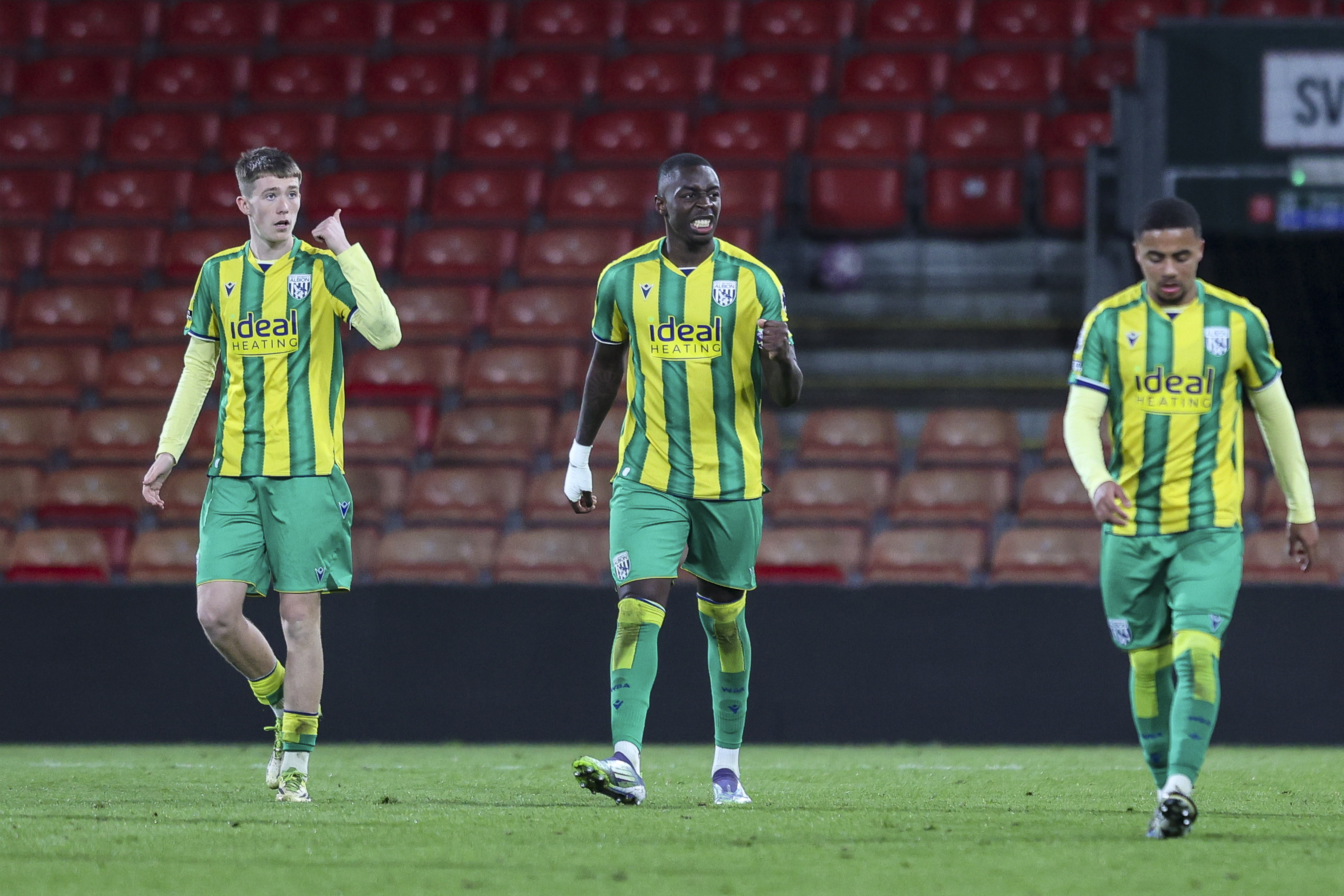 Eseosa Sule celebrates with team-mates after scoring against AFC Bournemouth in the Premier League Cup 