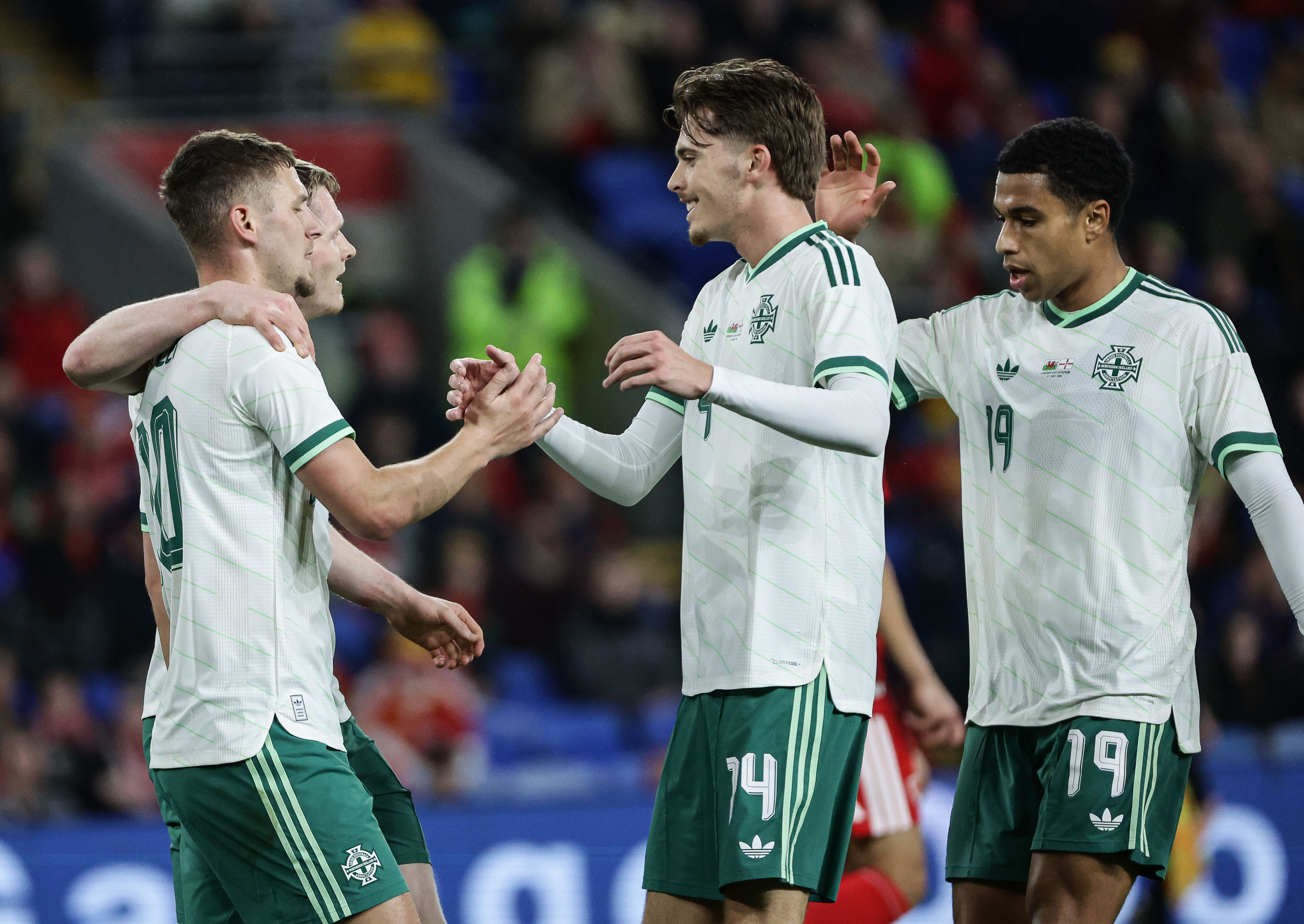 Isaac Price celebrates Northern Ireland's opener.