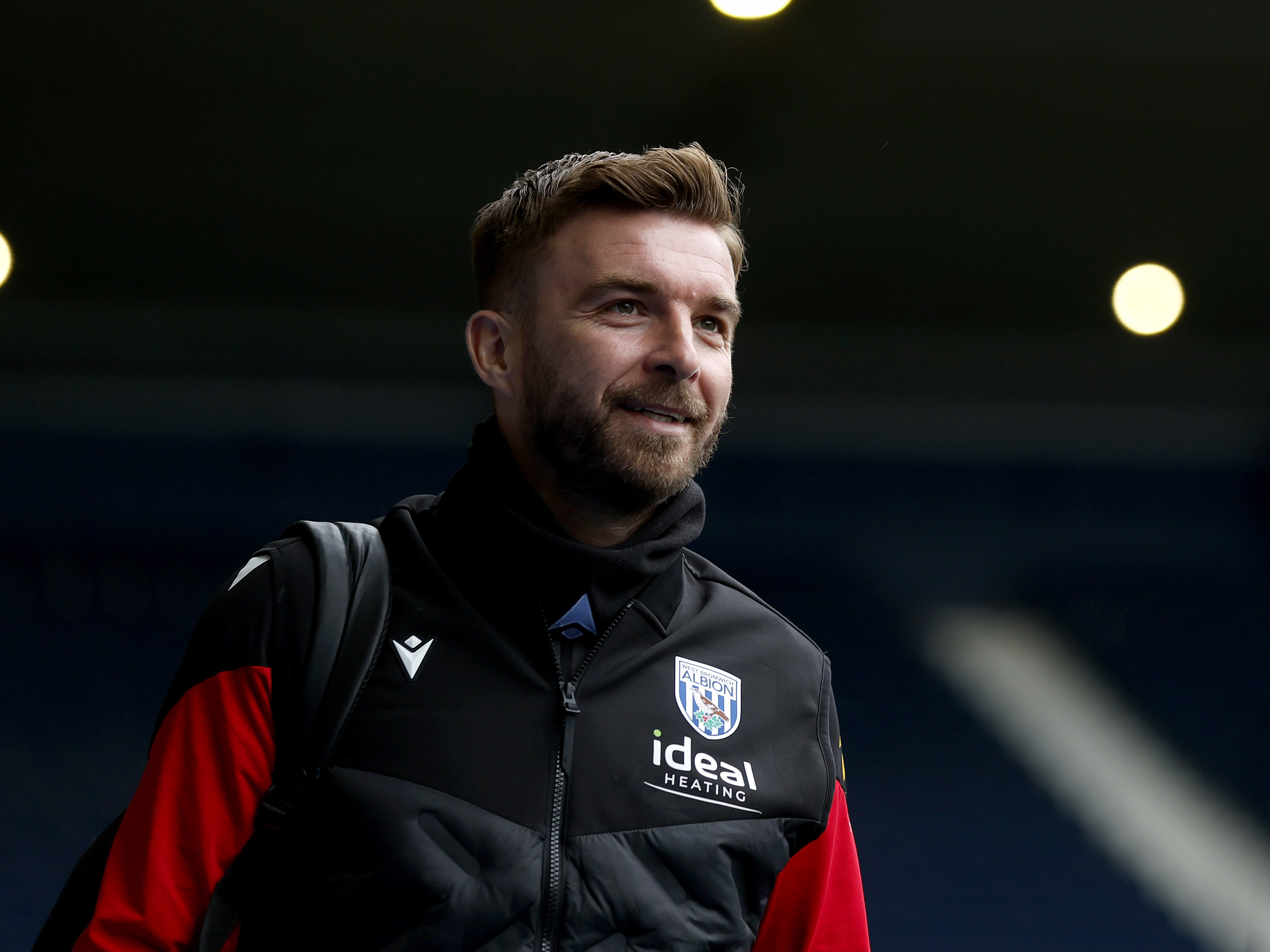 James Morrison smiling while arriving for a WBA game 