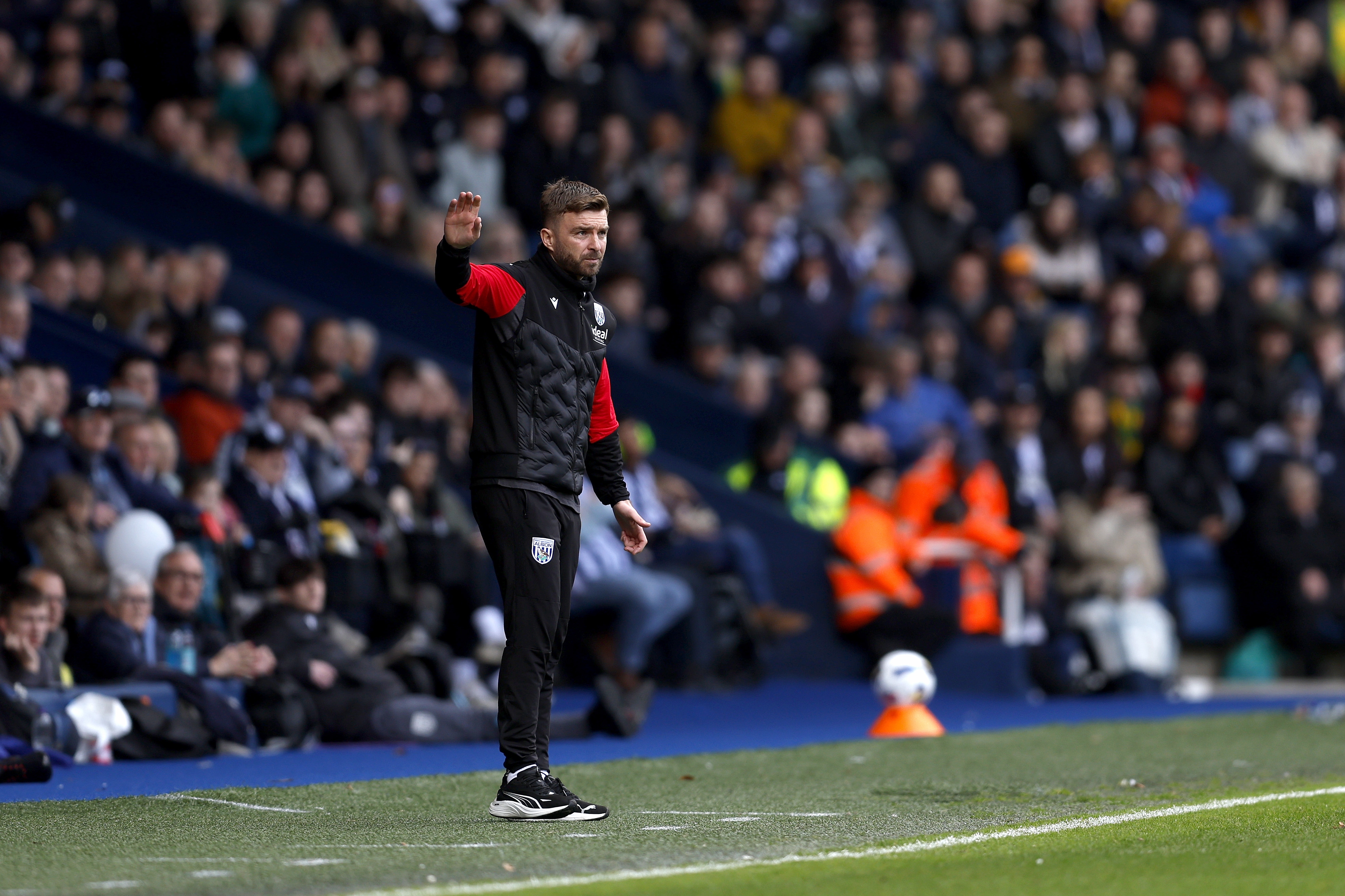 James Morrison on the side of the pitch at The Hawthorns during a game against Wrexham