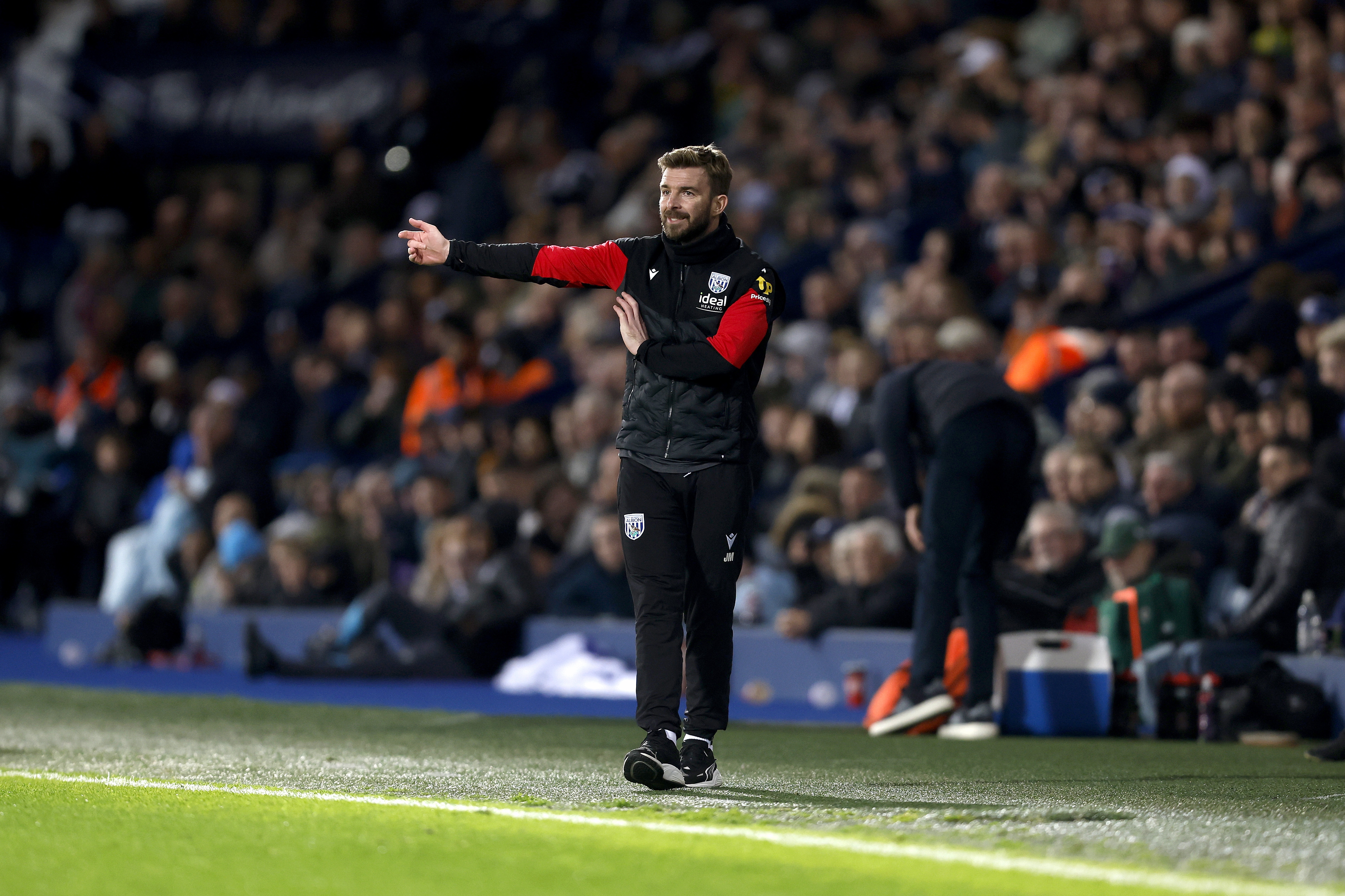 James Morrison on the side of the pitch at The Hawthorns during the game against Watford