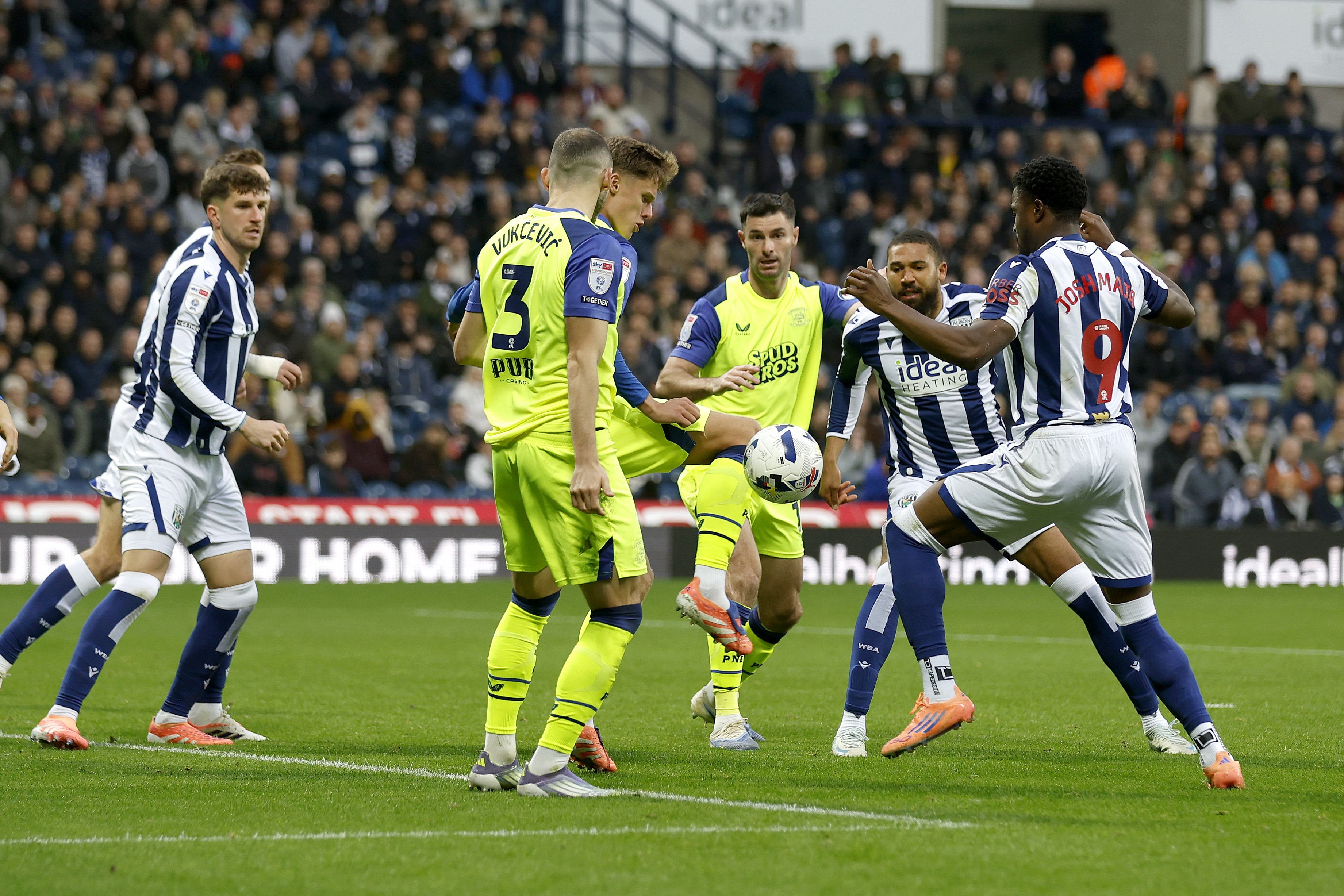 Several WBA and PNE players battle for the ball in the penalty area at The Hawthorns 