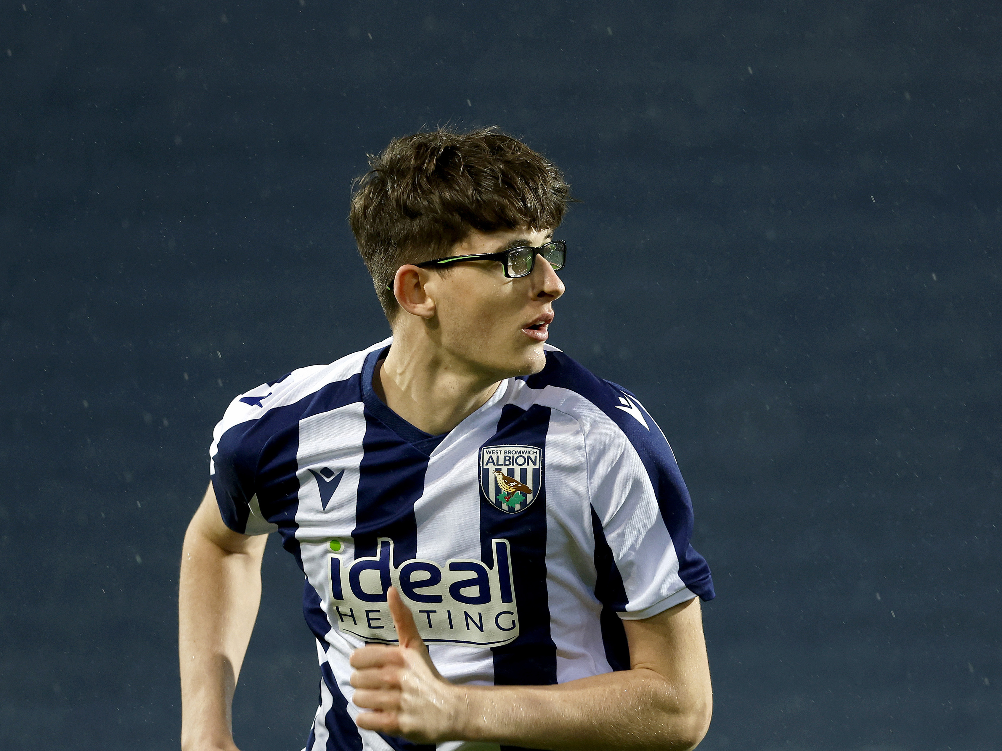 Cole Dexter in action for WBA in the home kit 