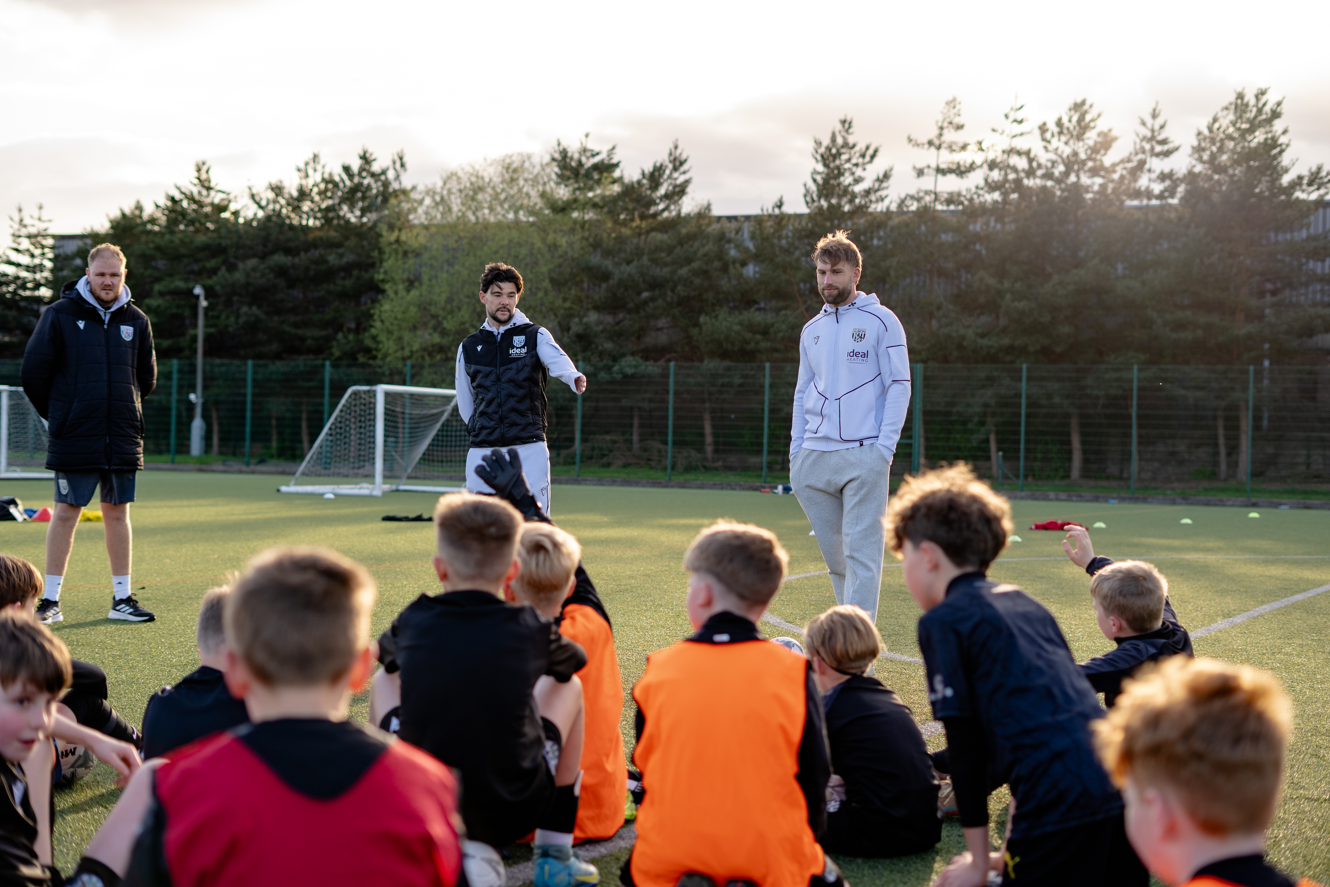 Alex Mowatt and Charlie Taylor engaging in a Q&A with a PDA Football session