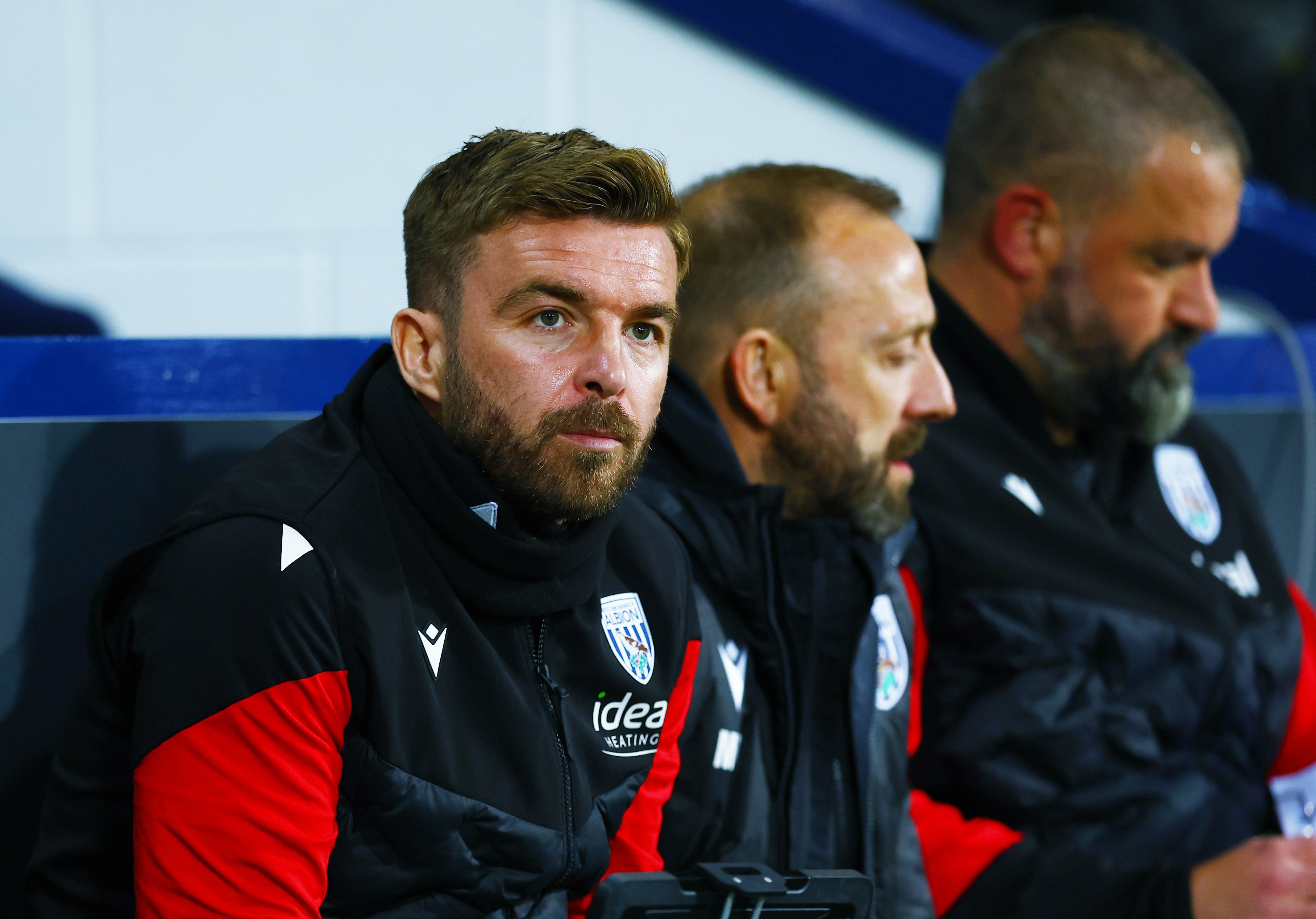 James Morrison sat in the dugout with Matt Gill and Boaz Myhill at The Hawthorns 