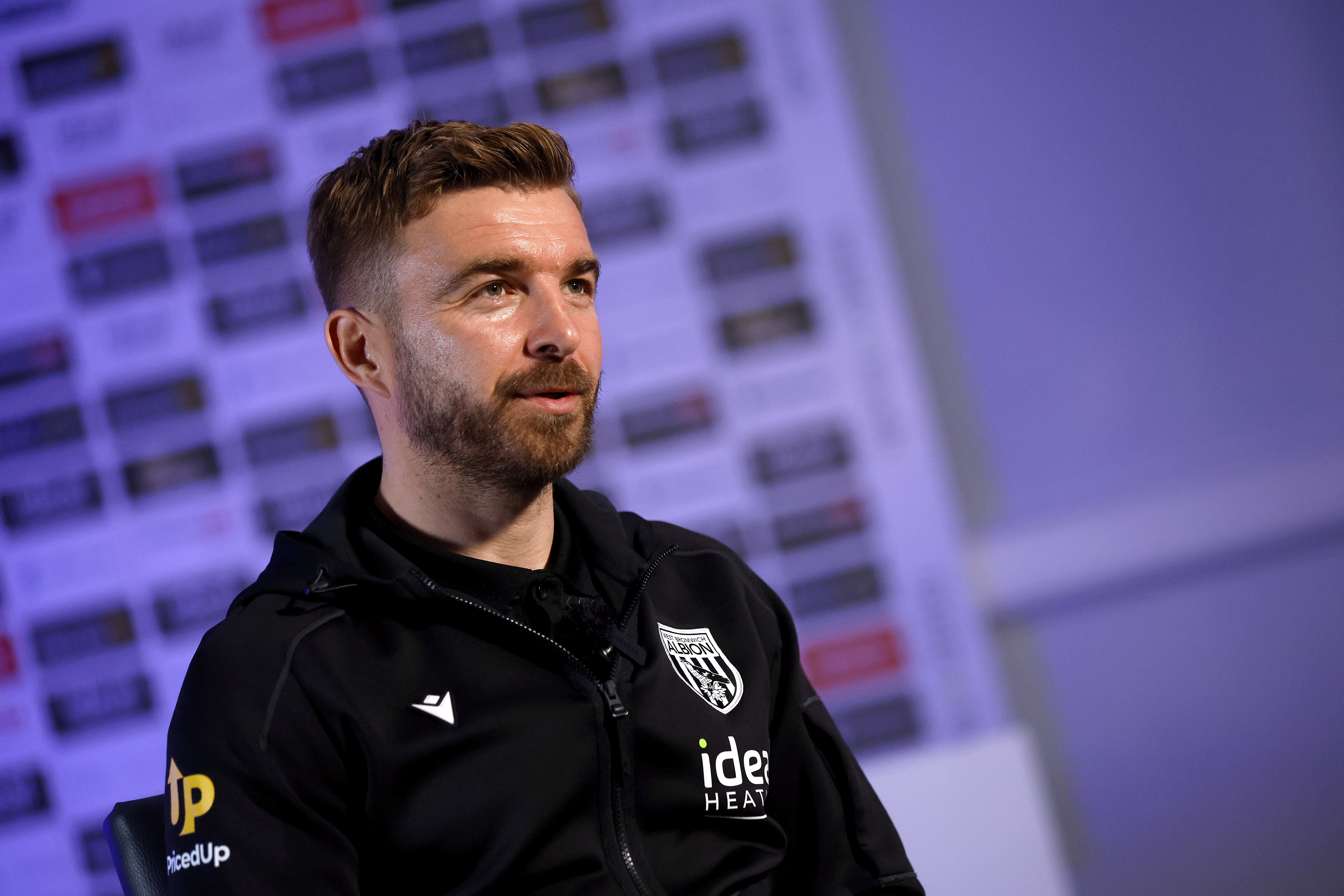 James Morrison being interviewed by WBA TV while wearing a WBA tracksuit 