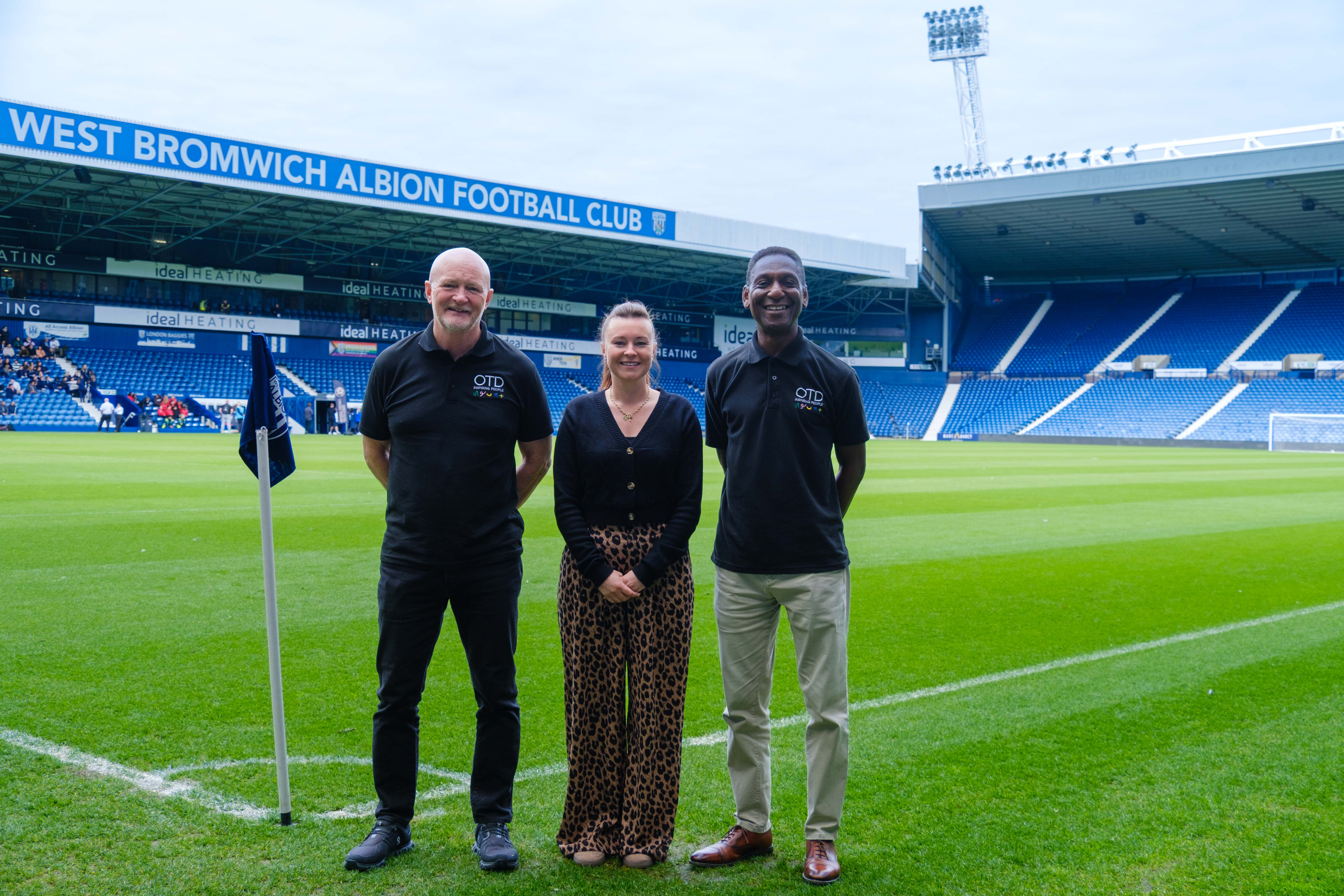 OTD Co-Founders Andy Crotty & Chris Cummins pitch side with Partnerships Coordinator Jayne Norton