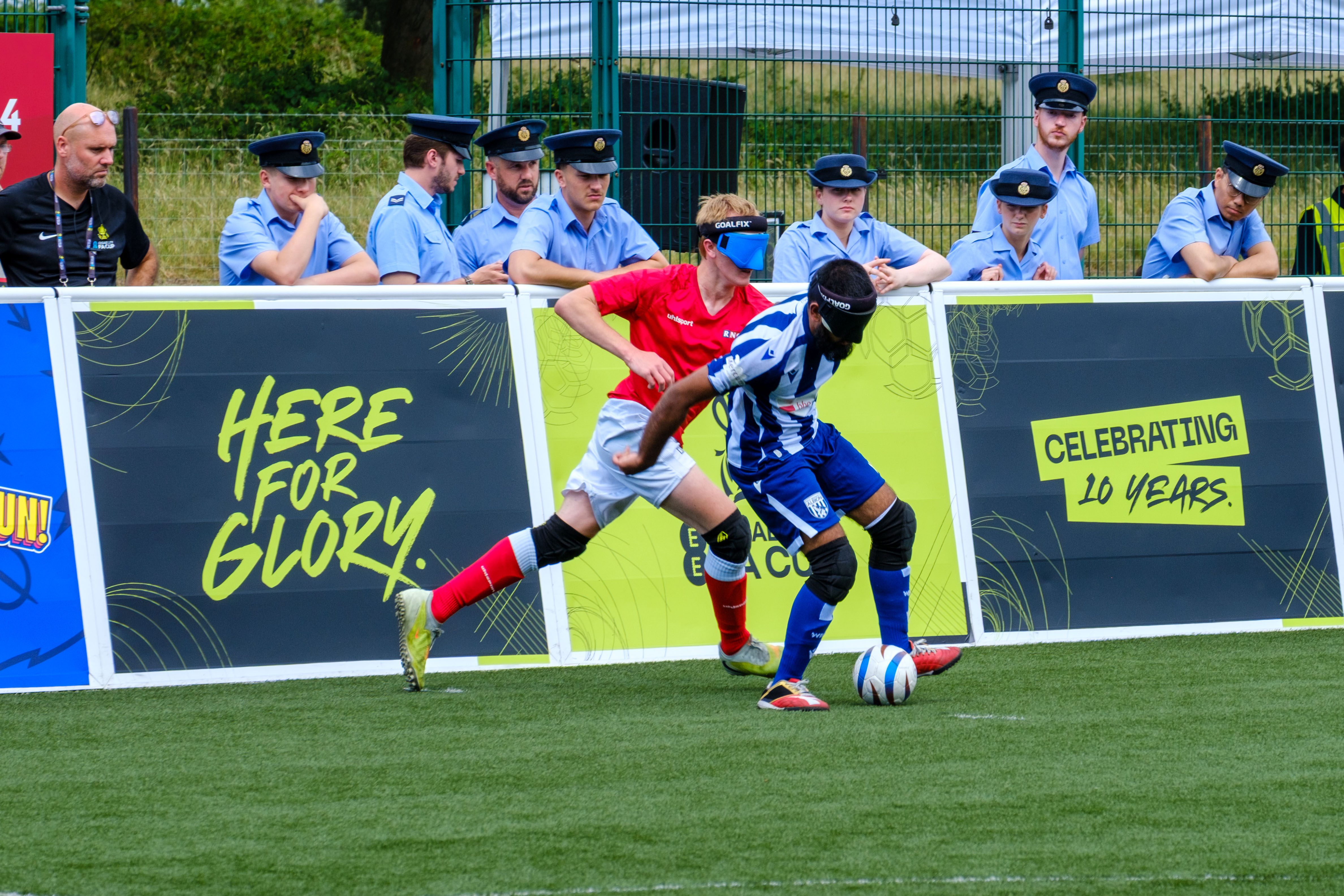 Eesa shielding a RNC player from the ball.
