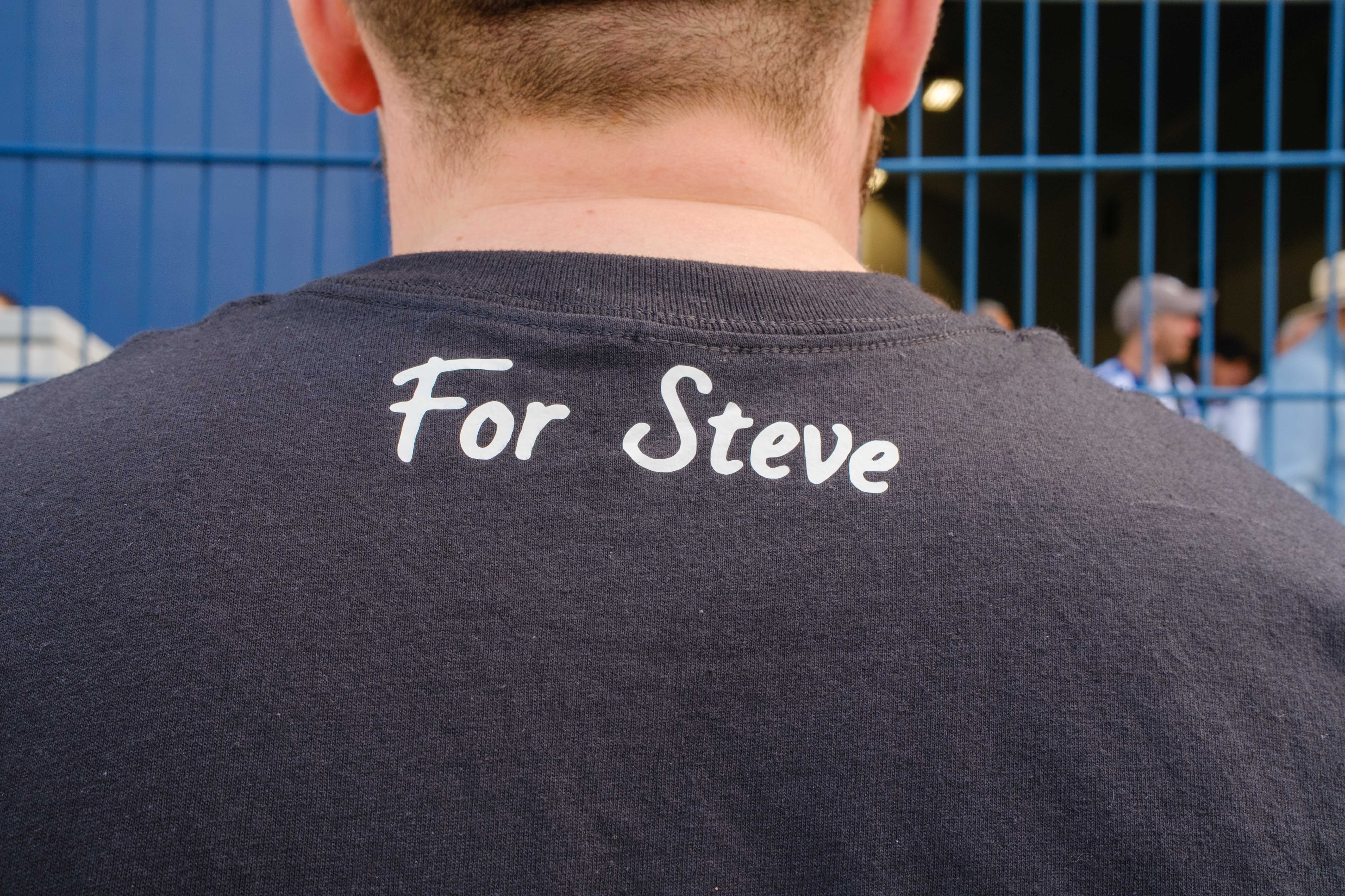 Close-up of the back of Moore Than Cancer team t-shirt displaying "For Steve"