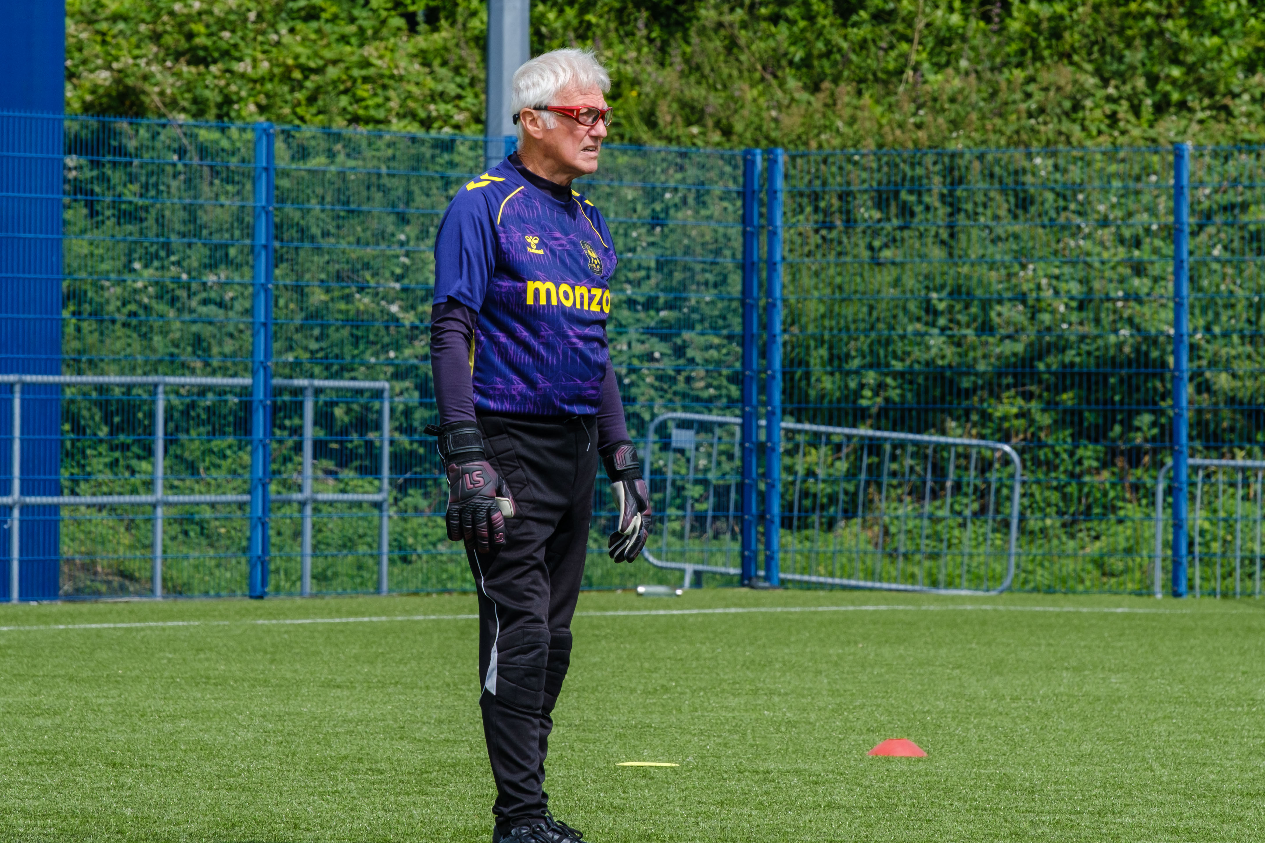 Sky Blue in the Community goalkeeper looking ahead