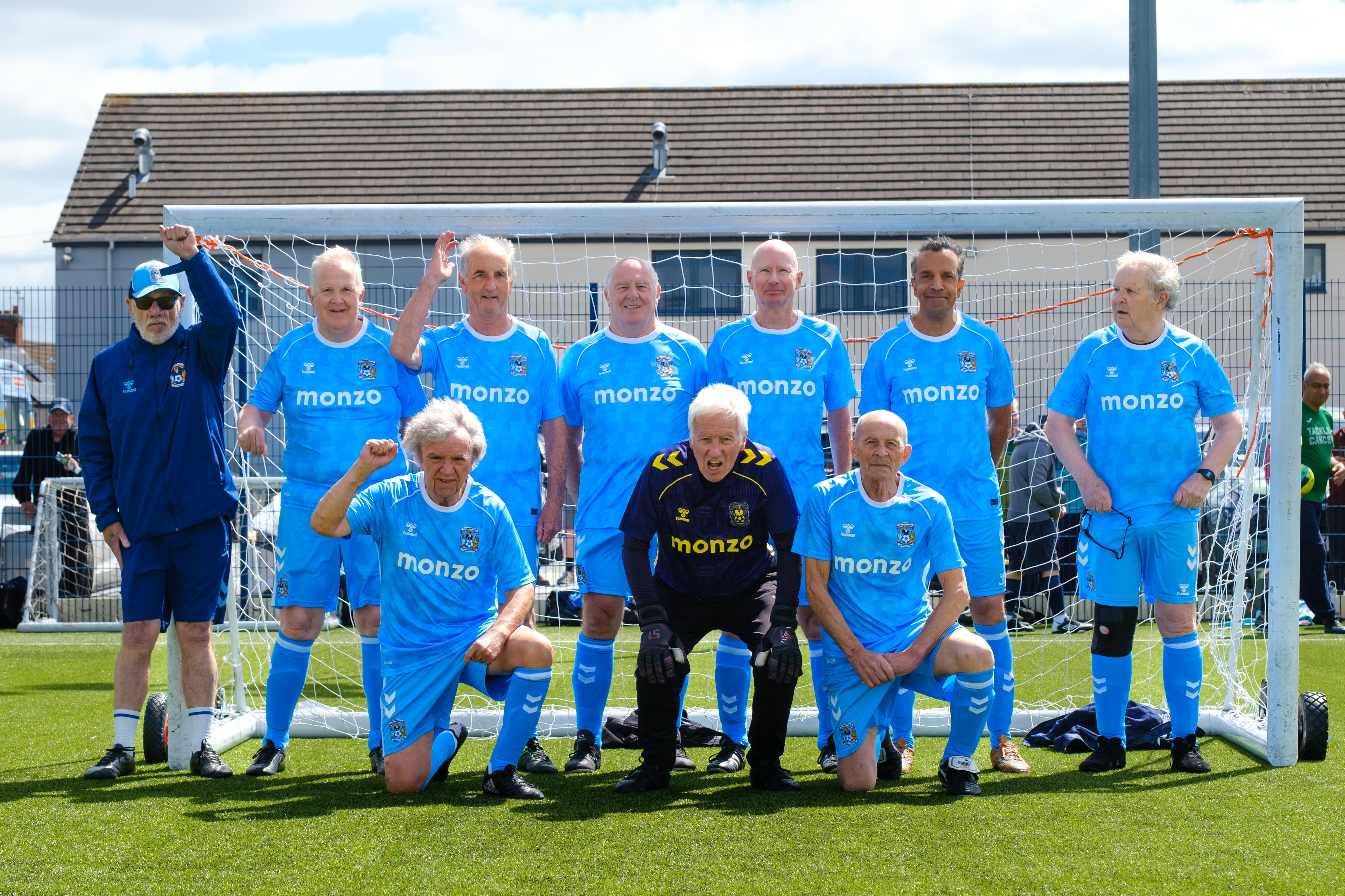 Sky Blues in the Community (Coventry City) team photo in front of the goal.