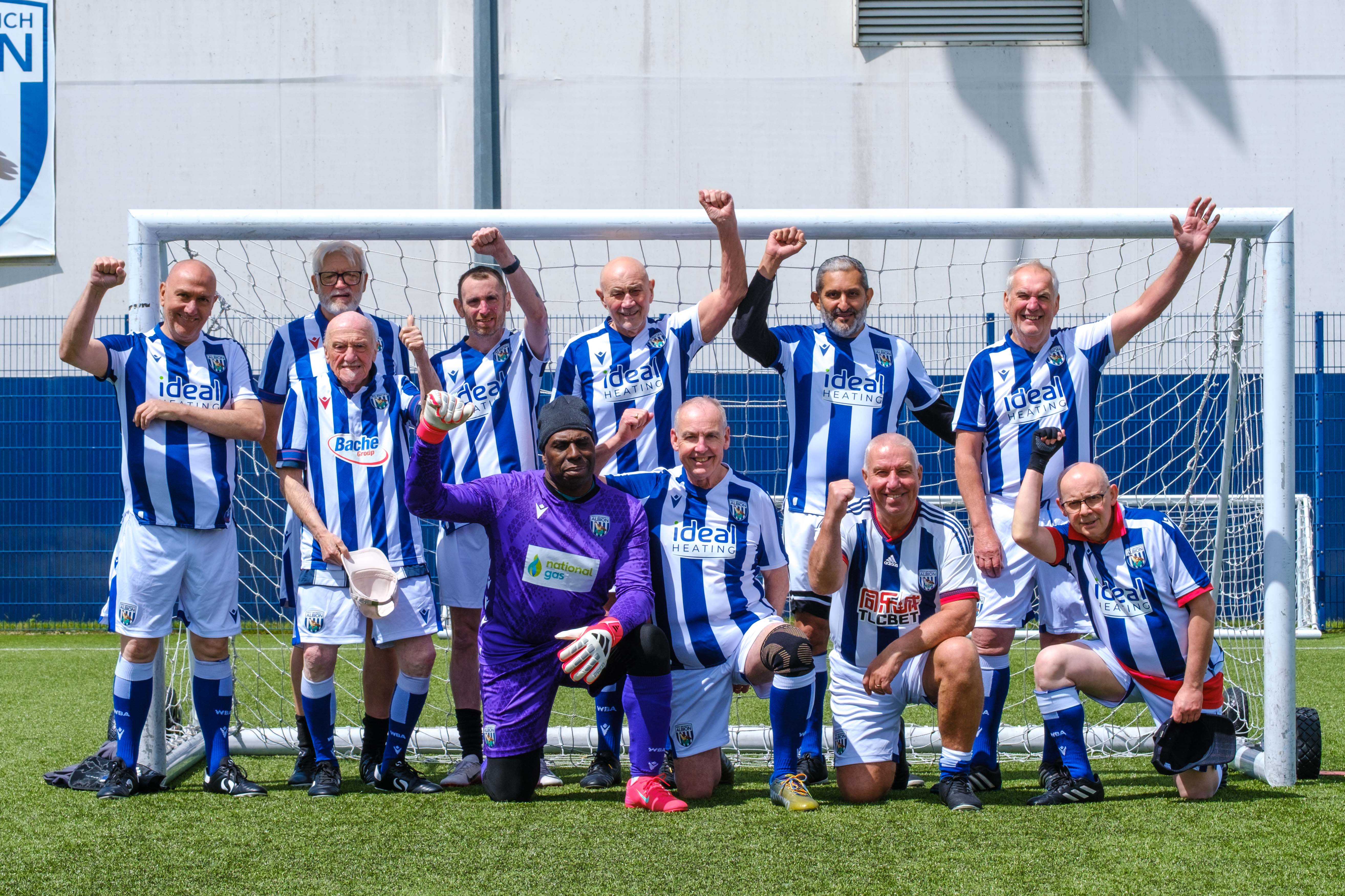 Cancer Kickers 2 team photo in front of the goal.