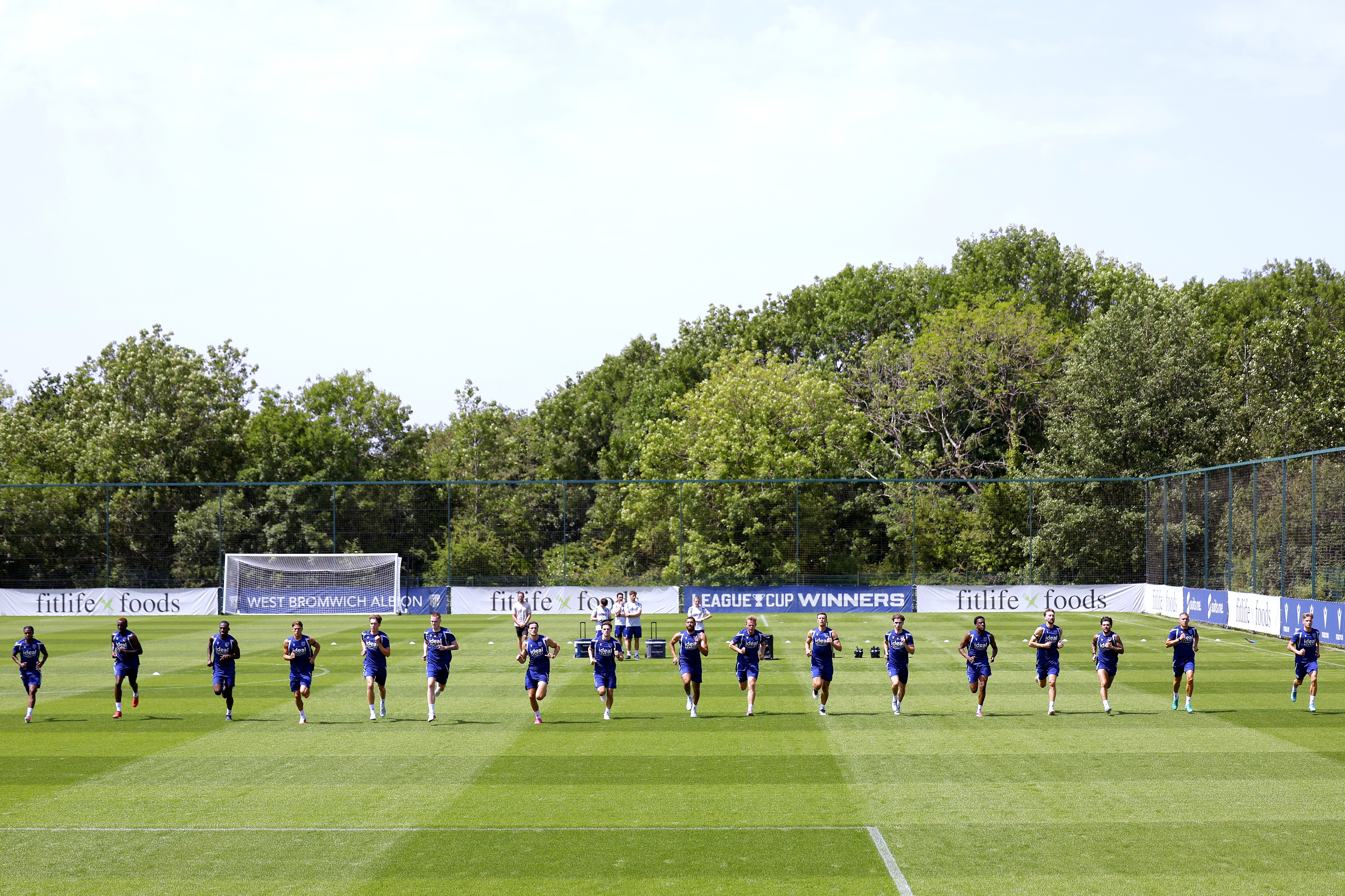 The first team squad running in pre-season.