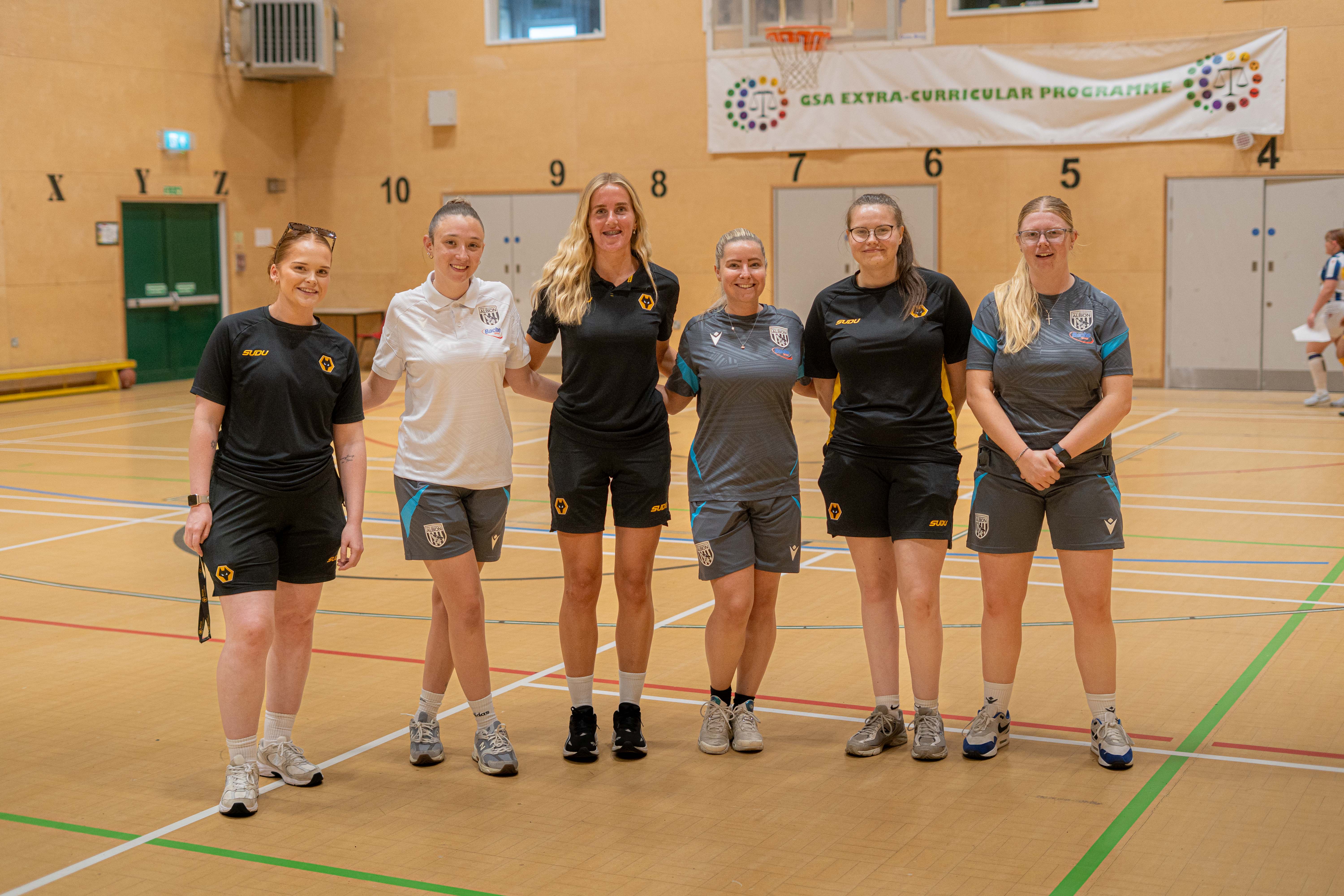 The Albion Foundation and The Wolves Foundation coaches in a group photo