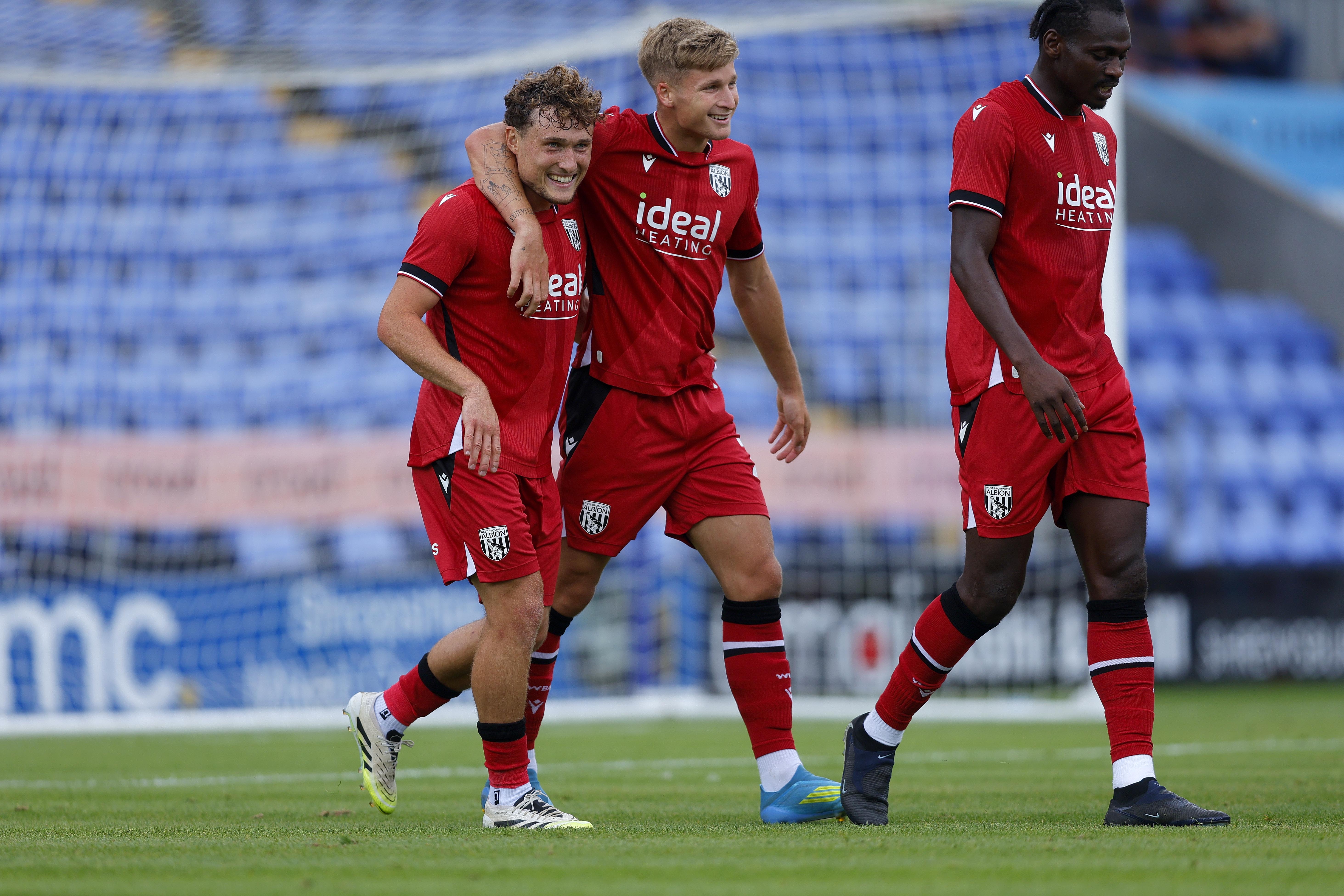 Jimmy-Jay Morgan and Callum Styles celebrate the second goal.