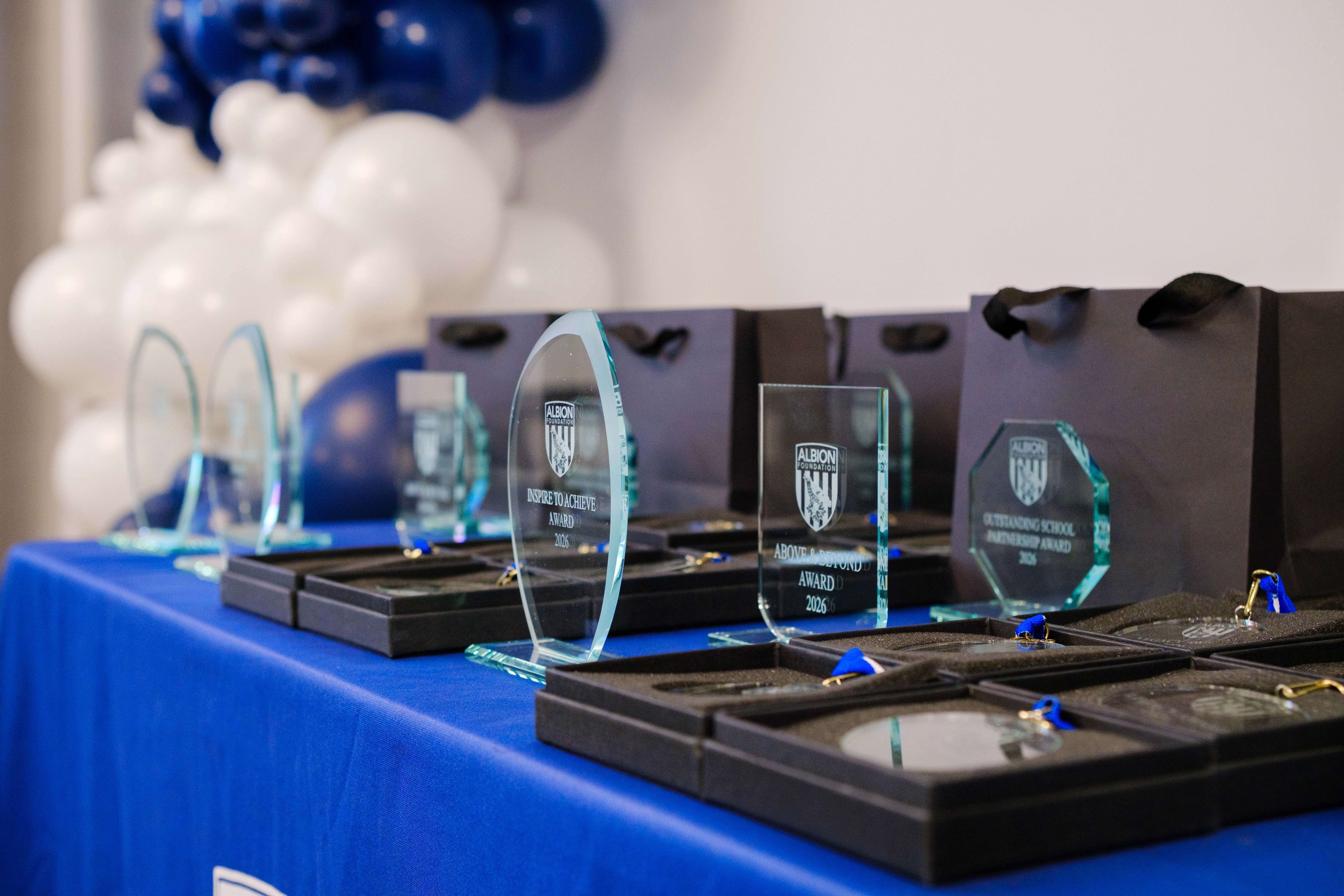 Glass awards trophies on a table