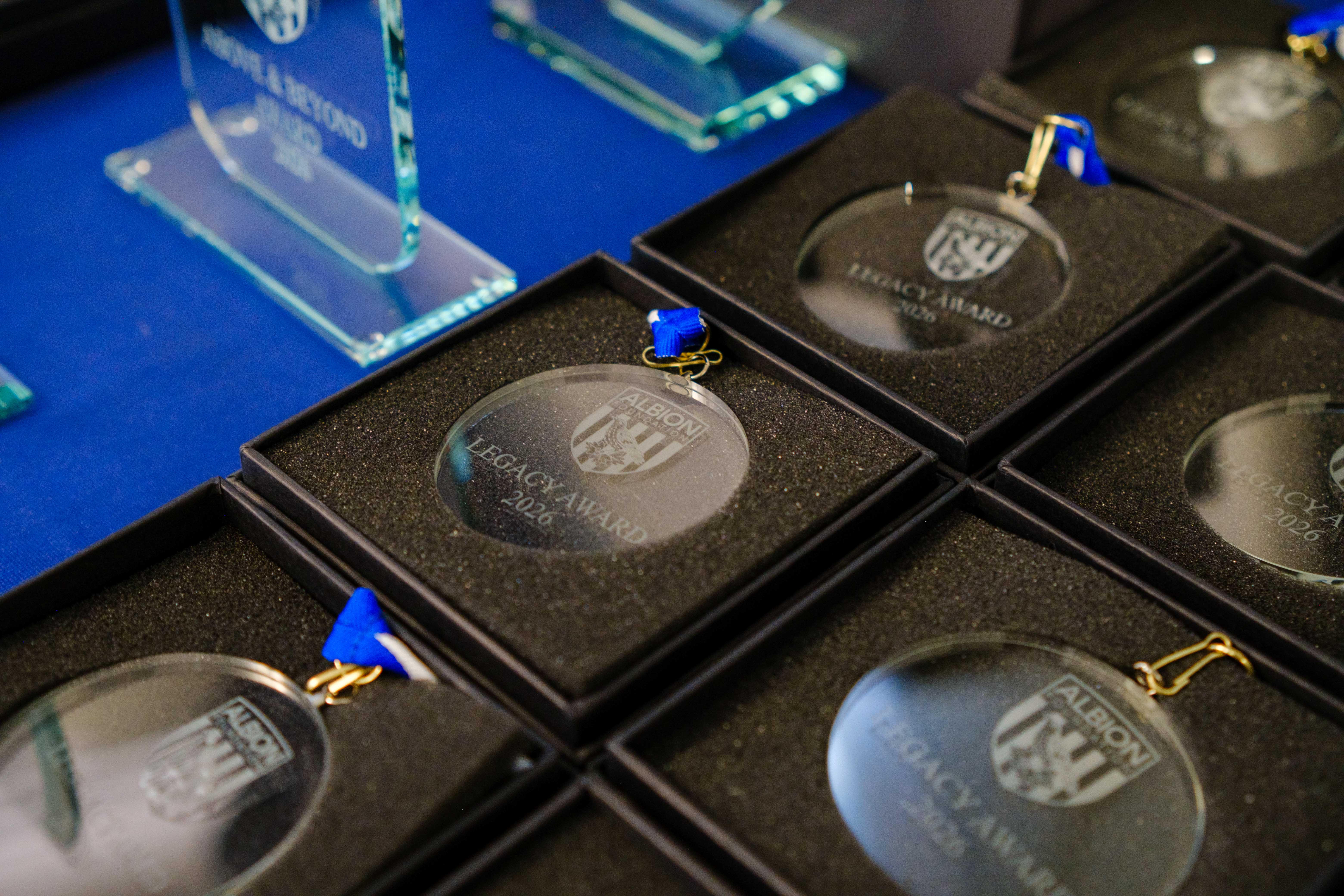 Close-up of Legacy Leader awards.