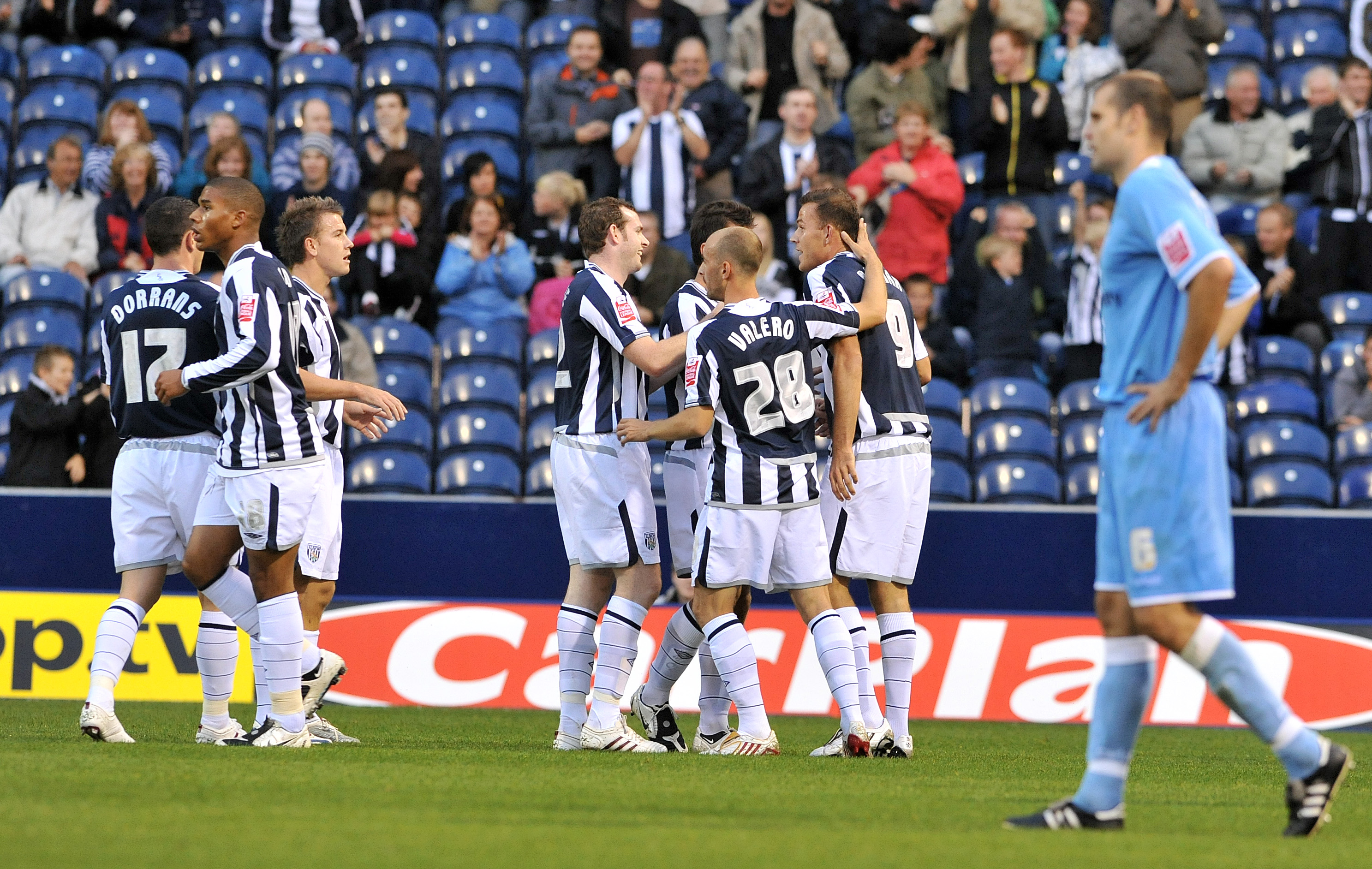 WBA players celebrate after scoring against Rotherham in the League Cup in 2009