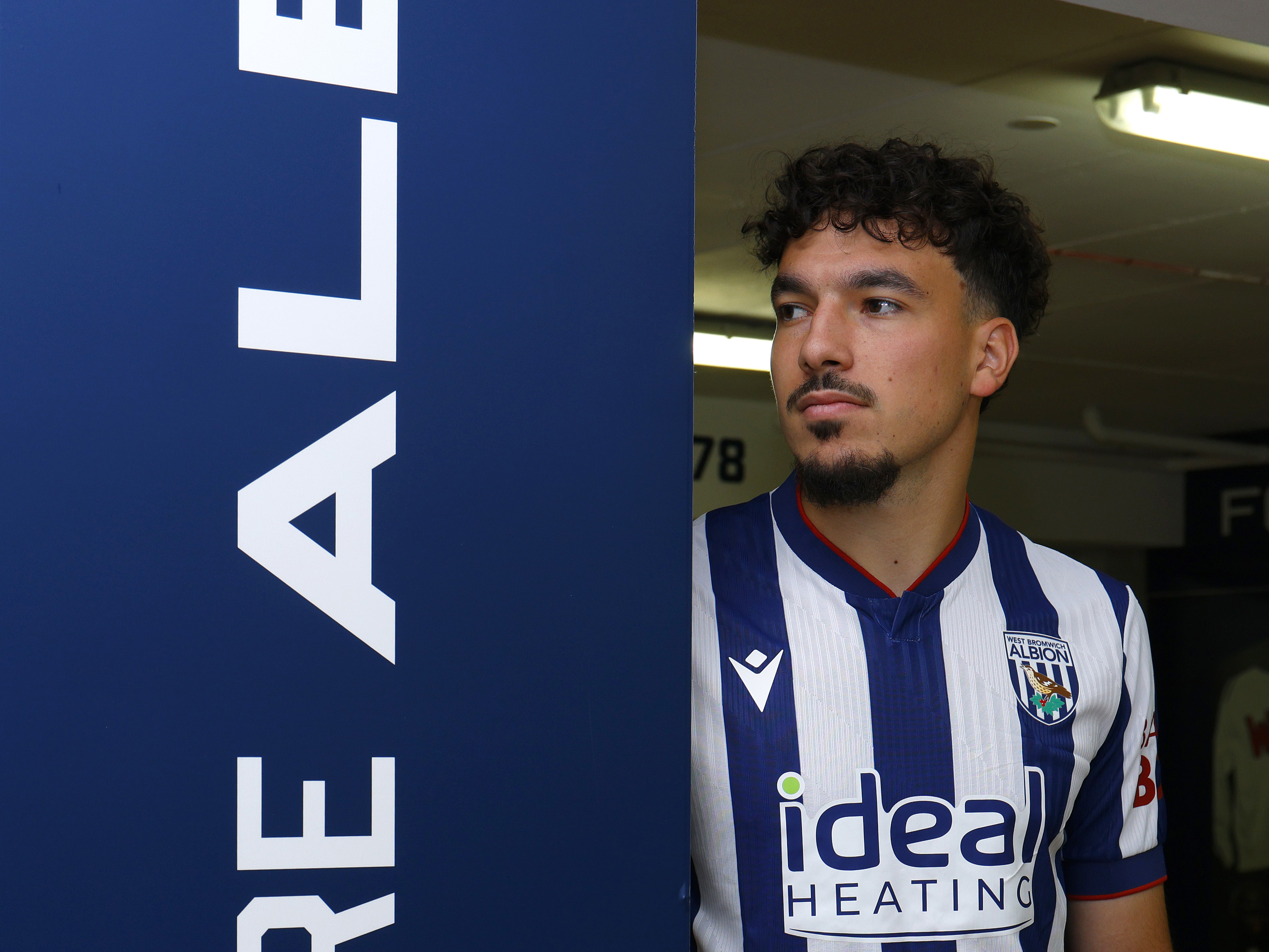 Nolan Galves in the home kit looking to his side