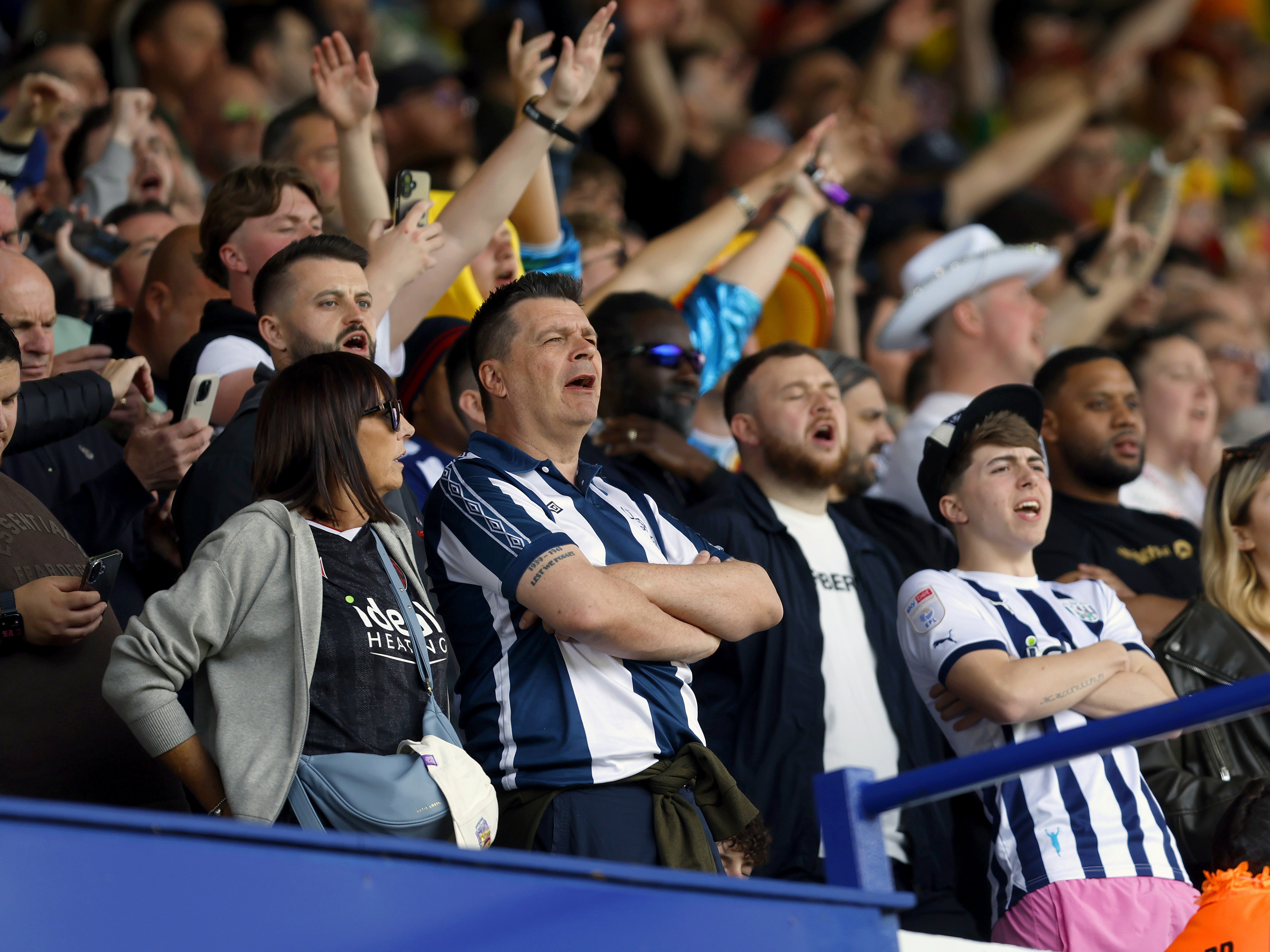 A general view of WBA fans cheering while in the stand at a game 