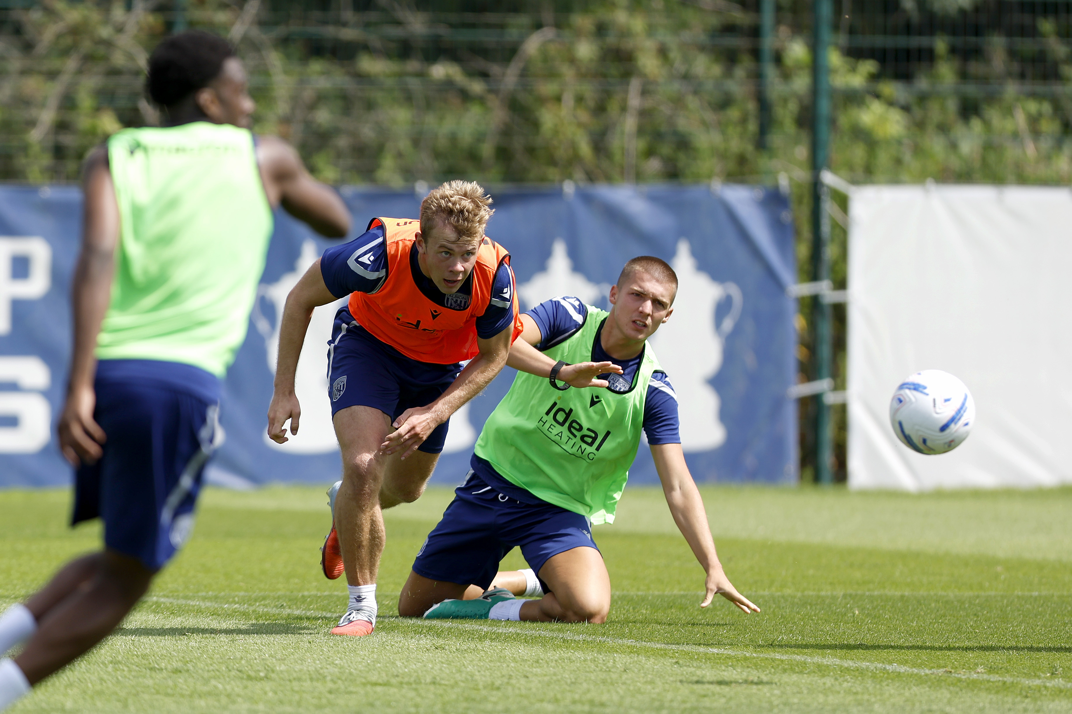 Aune Heggebø and Alfie Gilchrist battle for the ball in training 