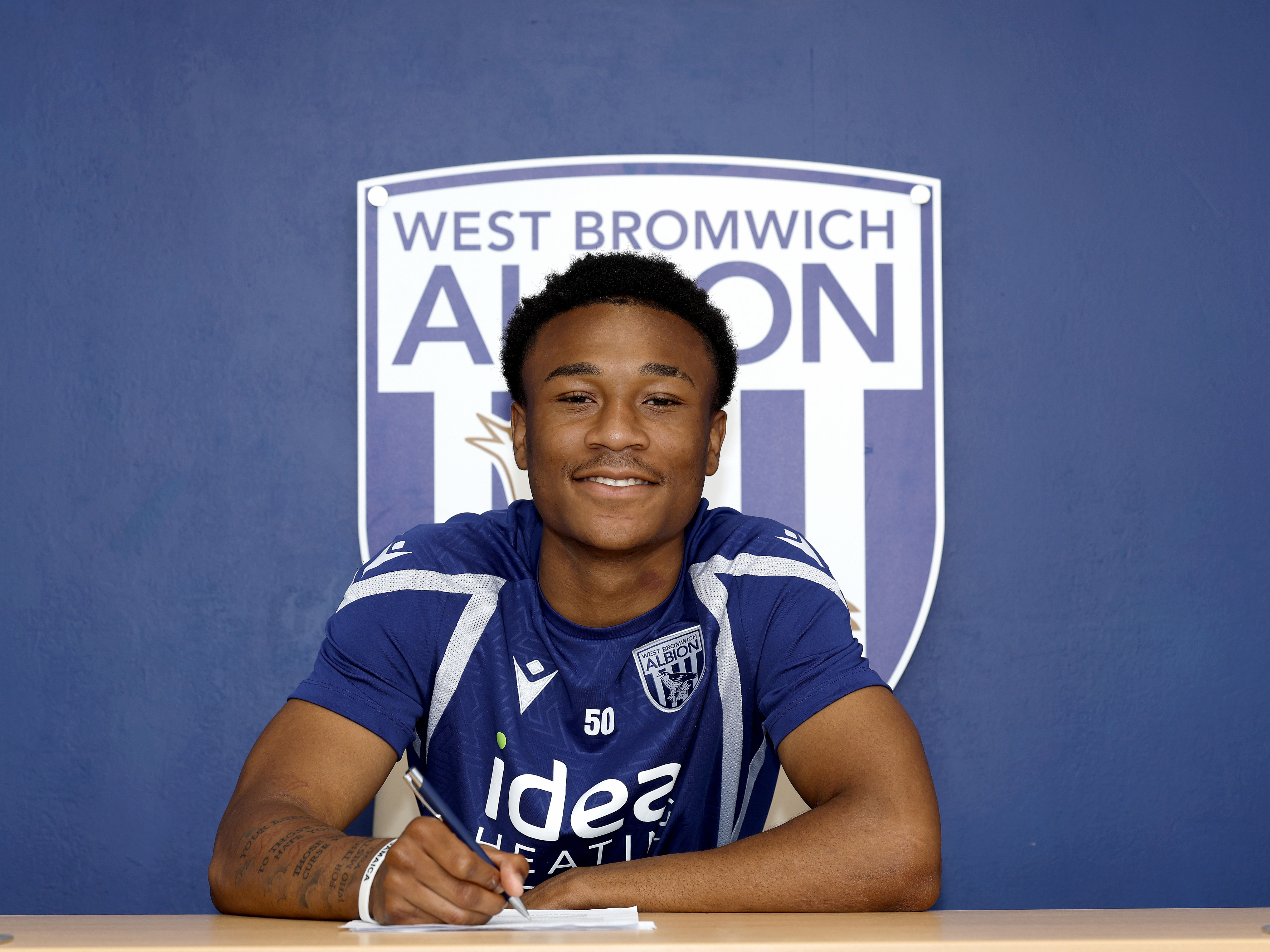 A photo of Albion youngster Jaiden Francis-Caesar signing pro terms