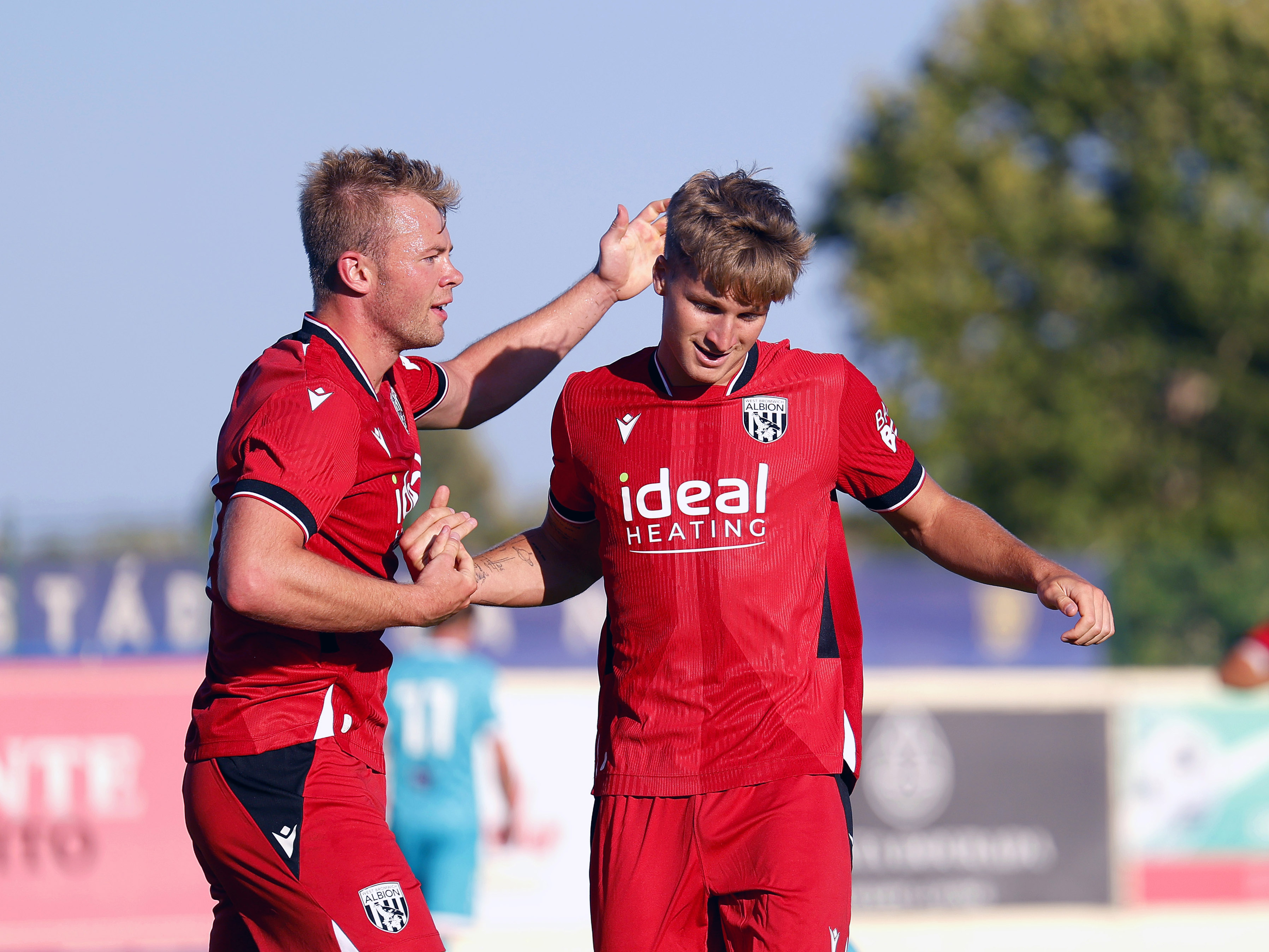 An image of Aune Heggebo and Jimmy Jay Morgan celebrating a goal against Bromley