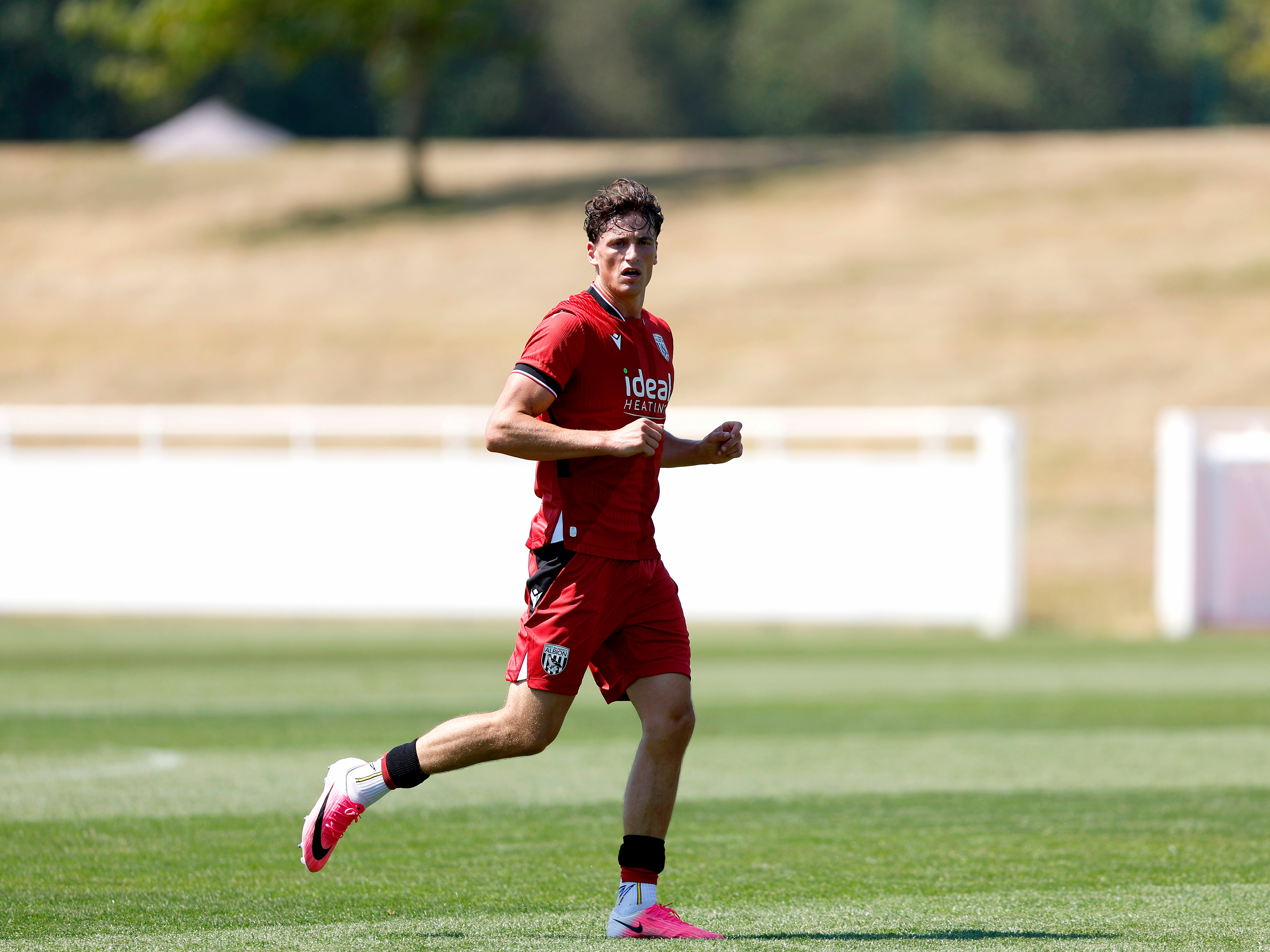 Barney Stewart plays in the red away kit