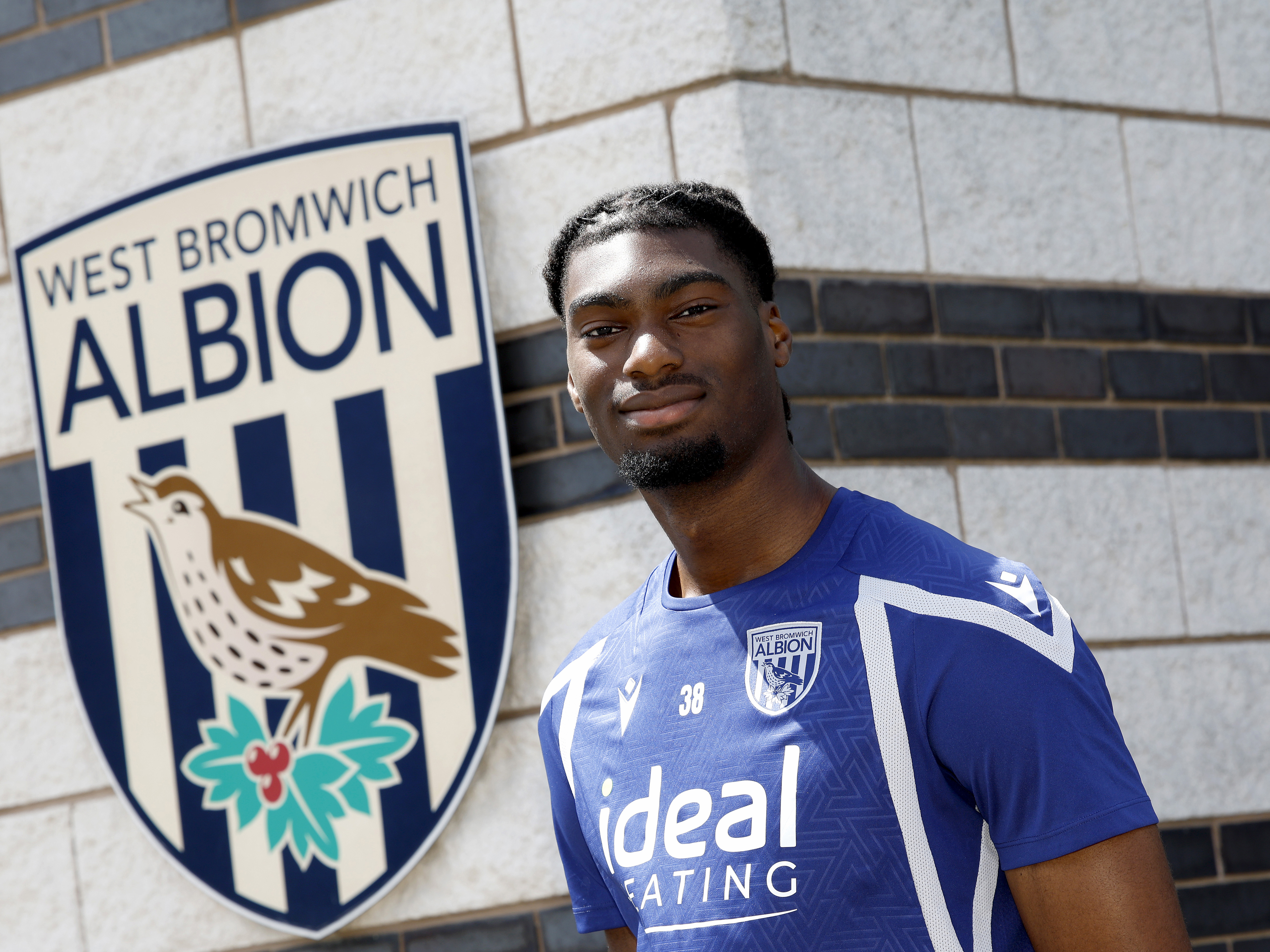 A photo of youngster Brian Okonkwo after signing a new deal