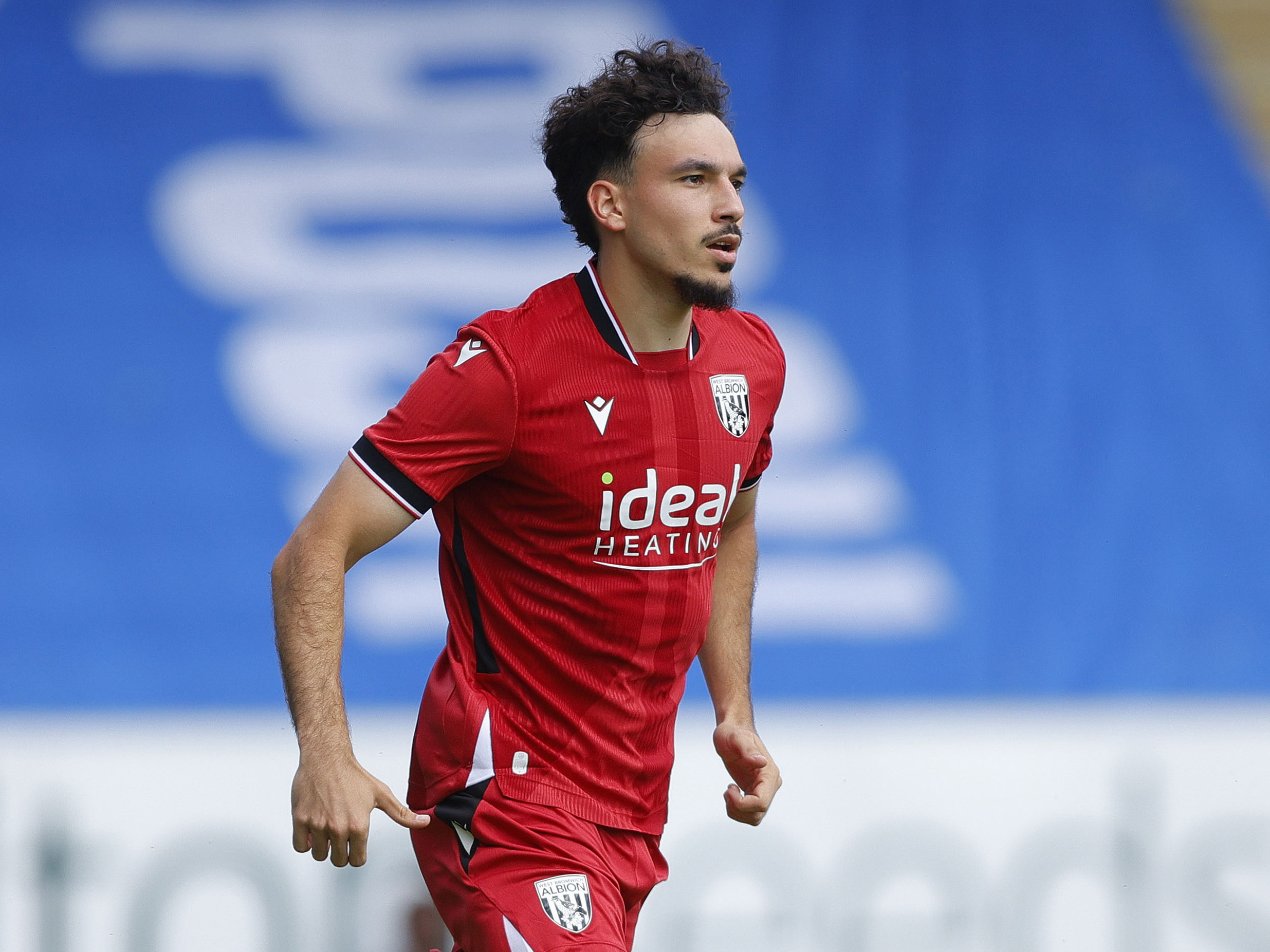 Nolan Galves in action in the red away kit at Peterborough 